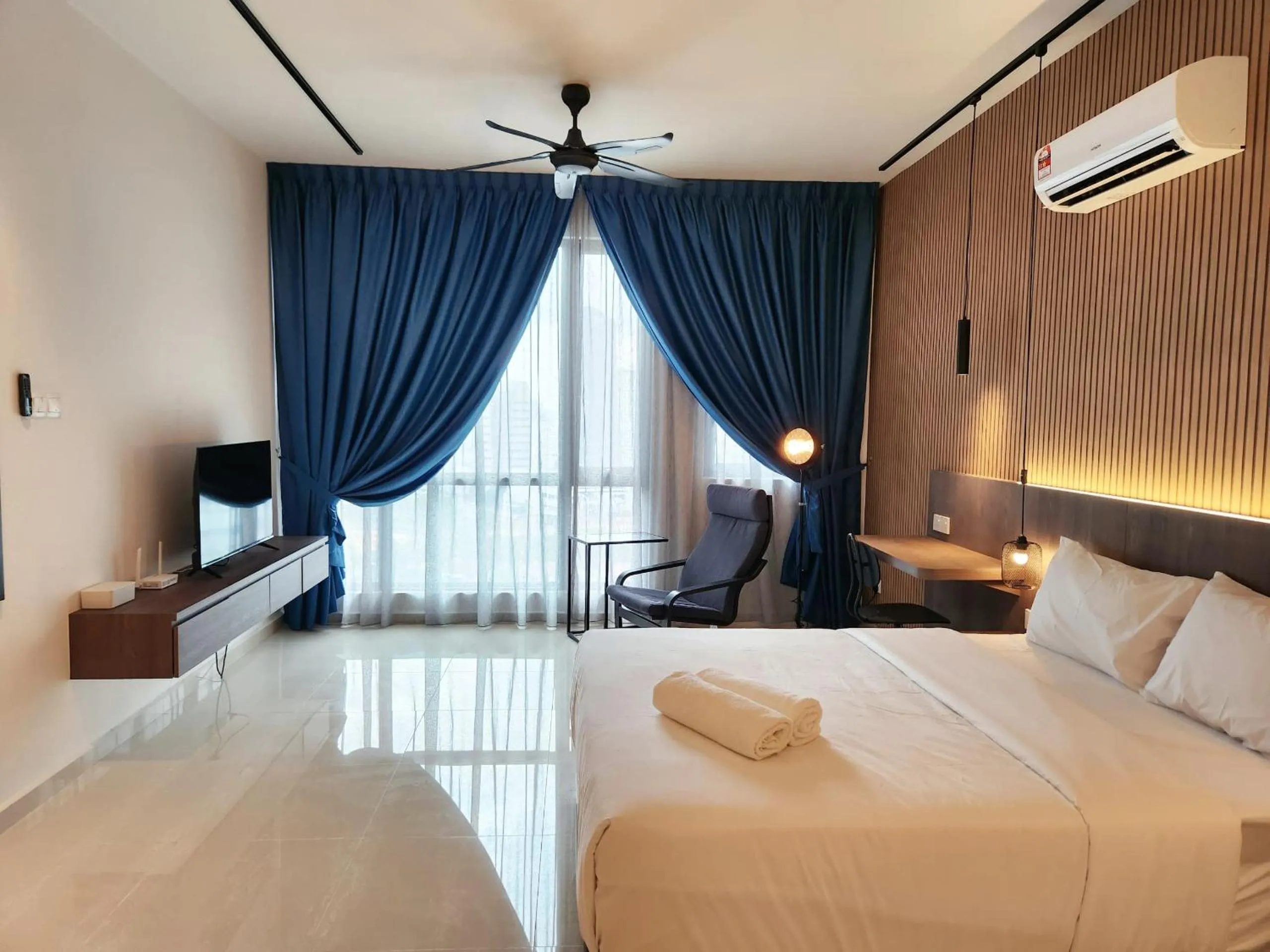 Bed in SKS Pavillion Suites