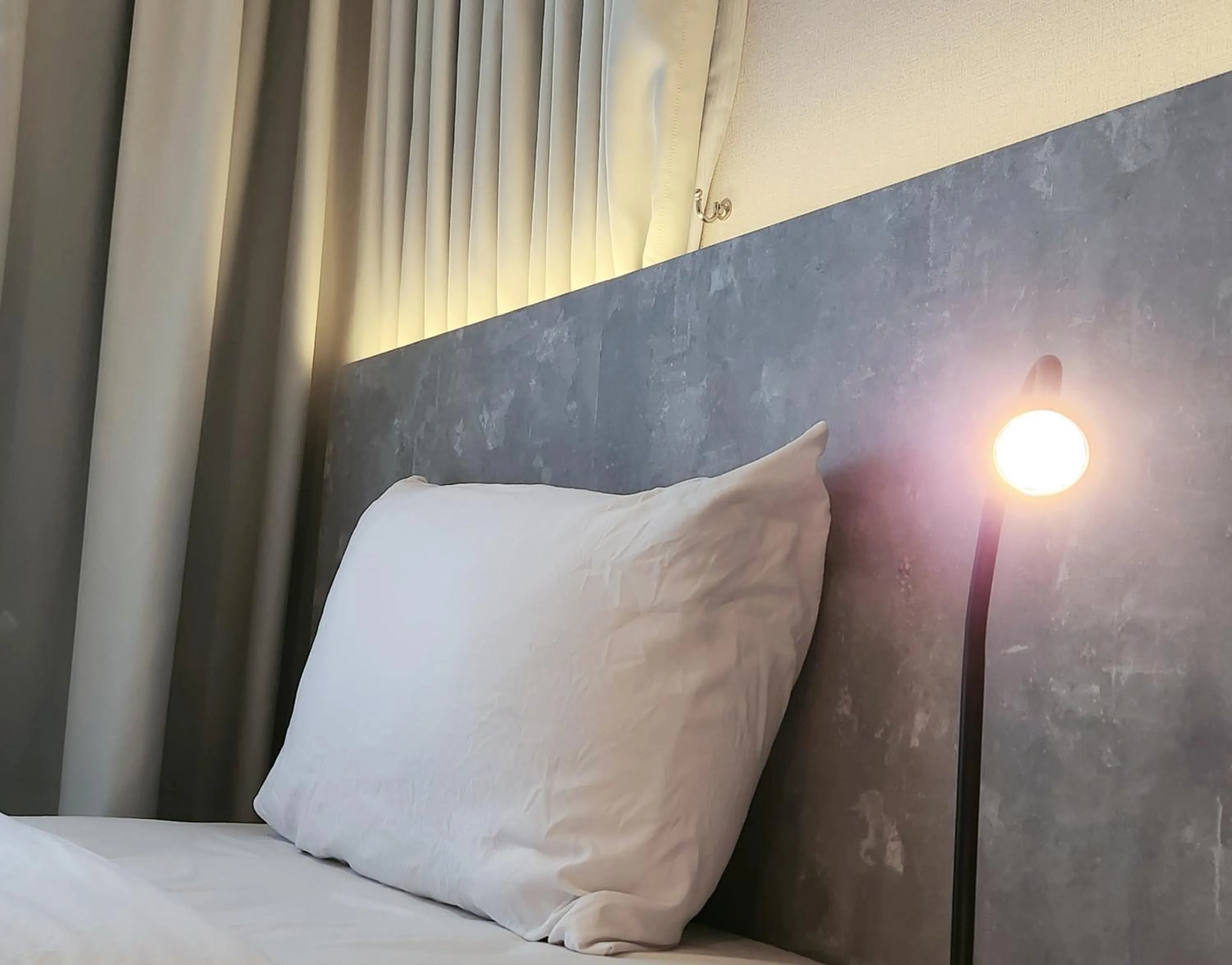 Bed in SKS Pavillion Suites