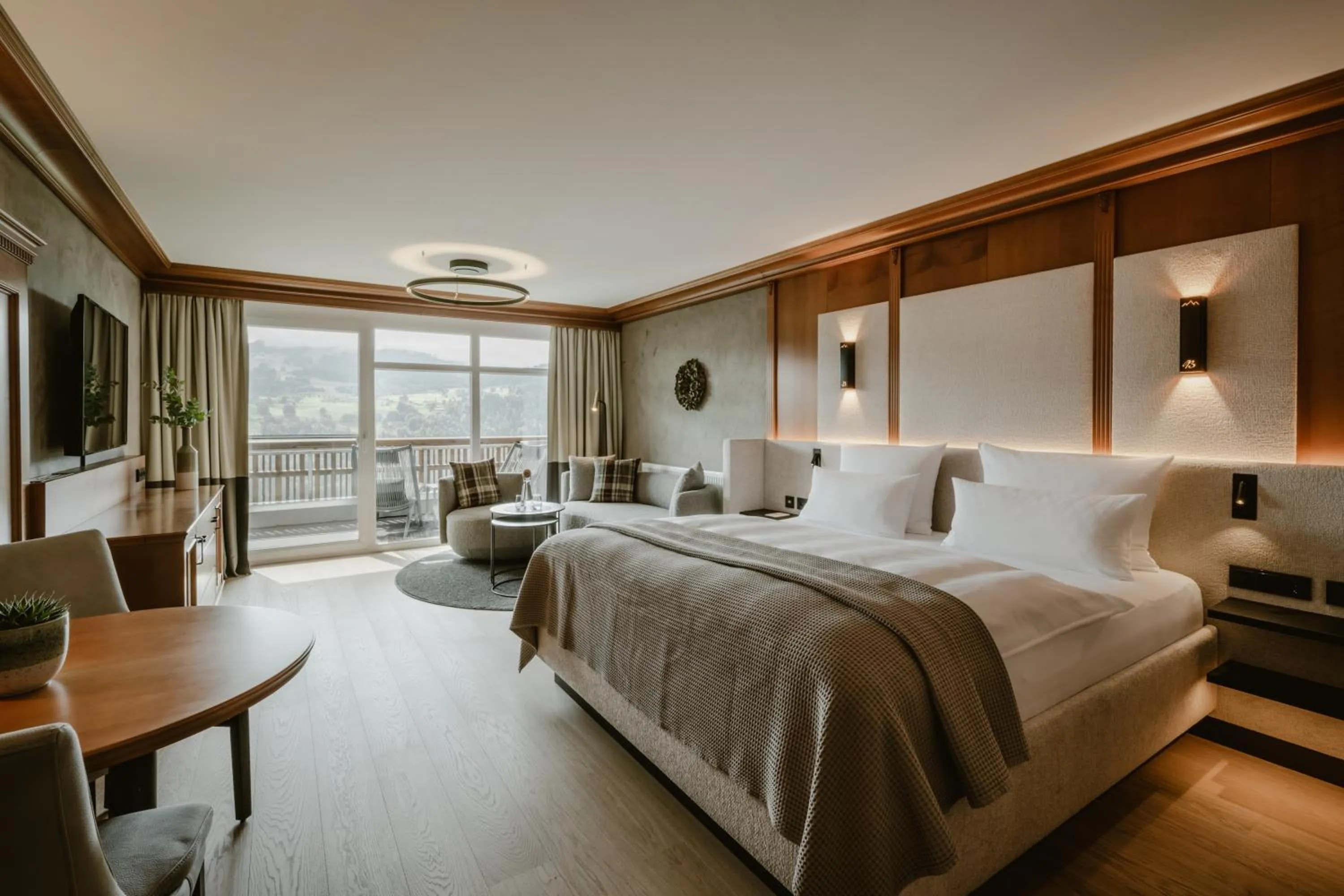 Living room, Bed in Bergkristall - Mein Resort im Allgäu