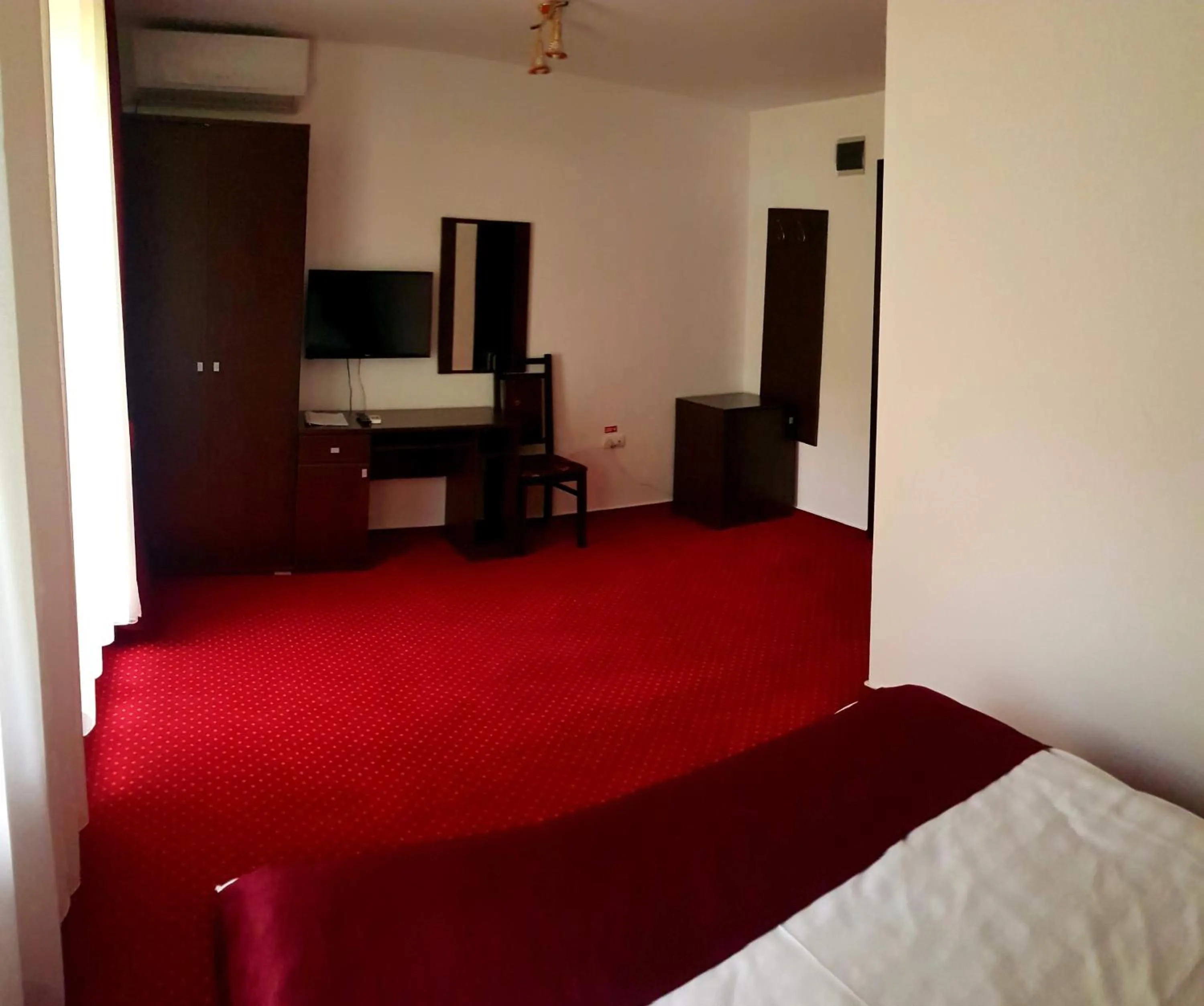 Bed in Hotel Hermes