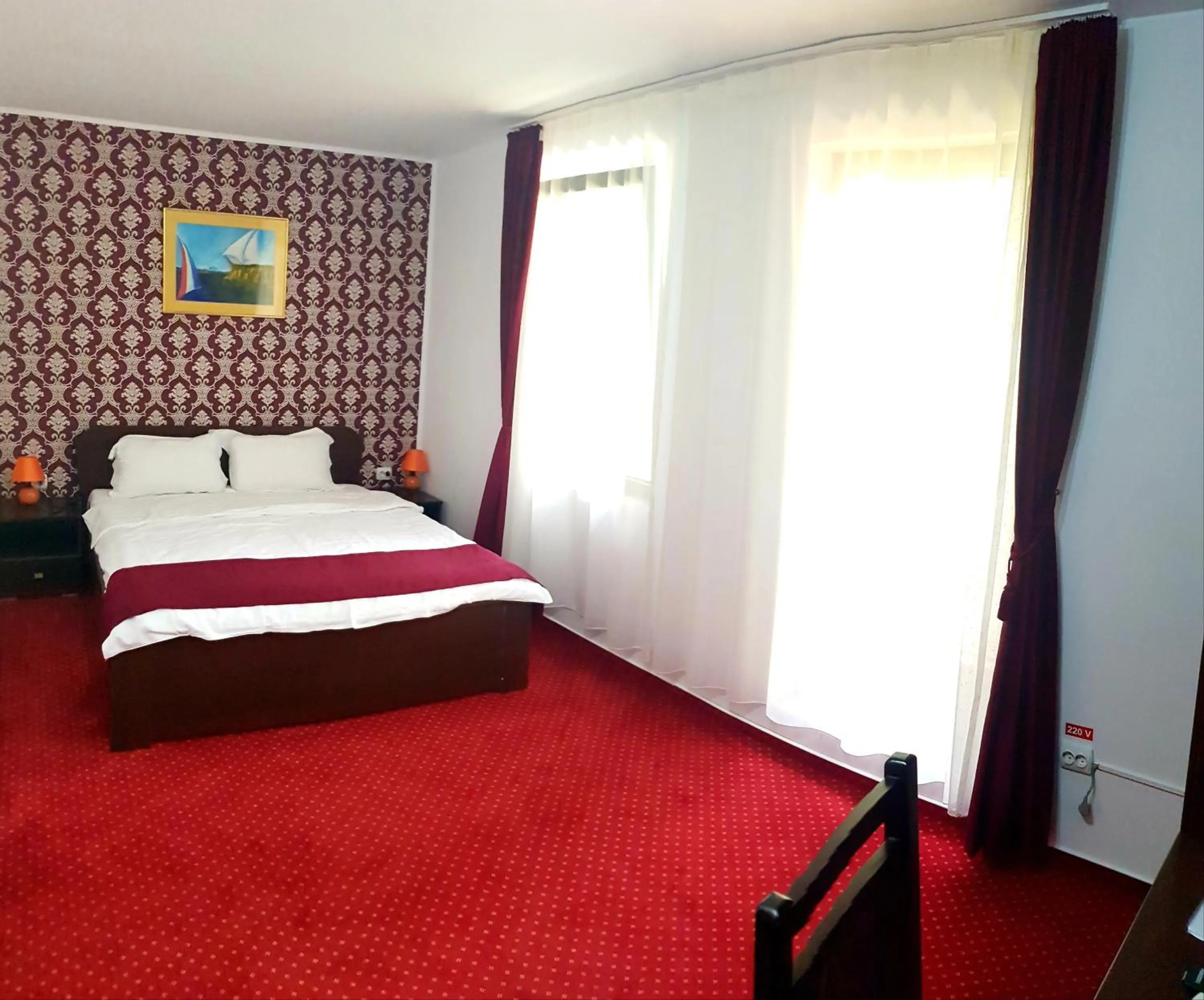 Bed in Hotel Hermes