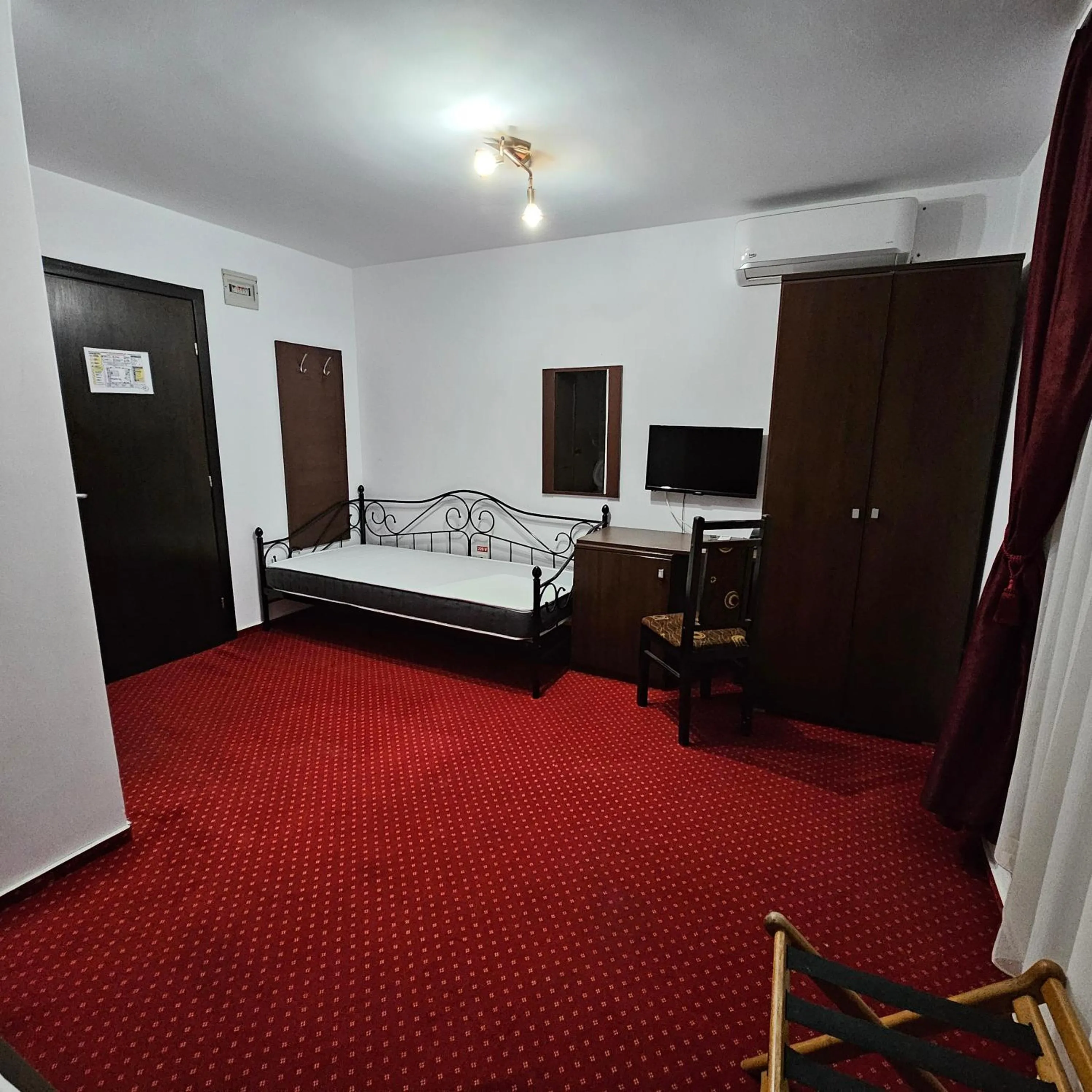 Bed in Hotel Hermes