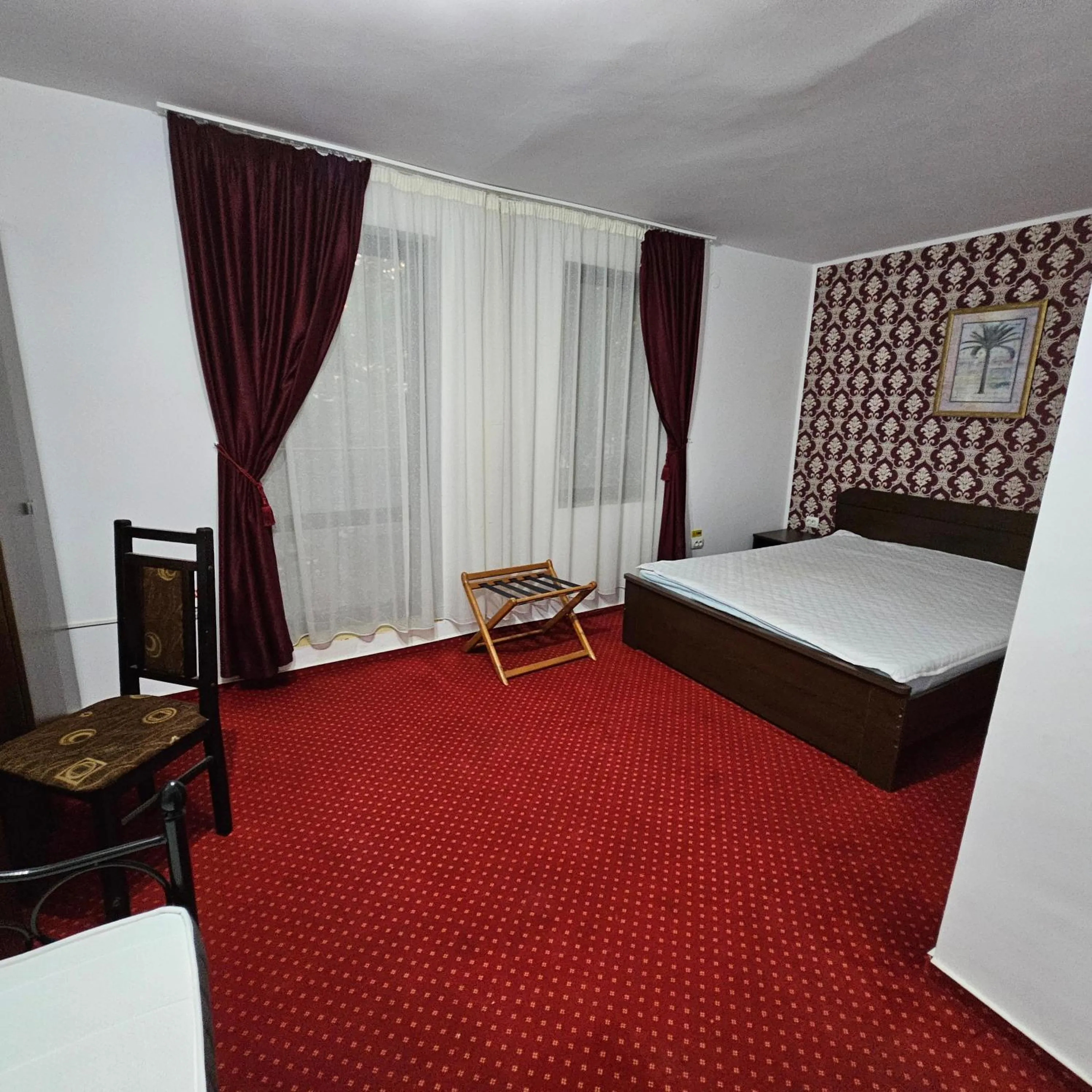 Bed in Hotel Hermes