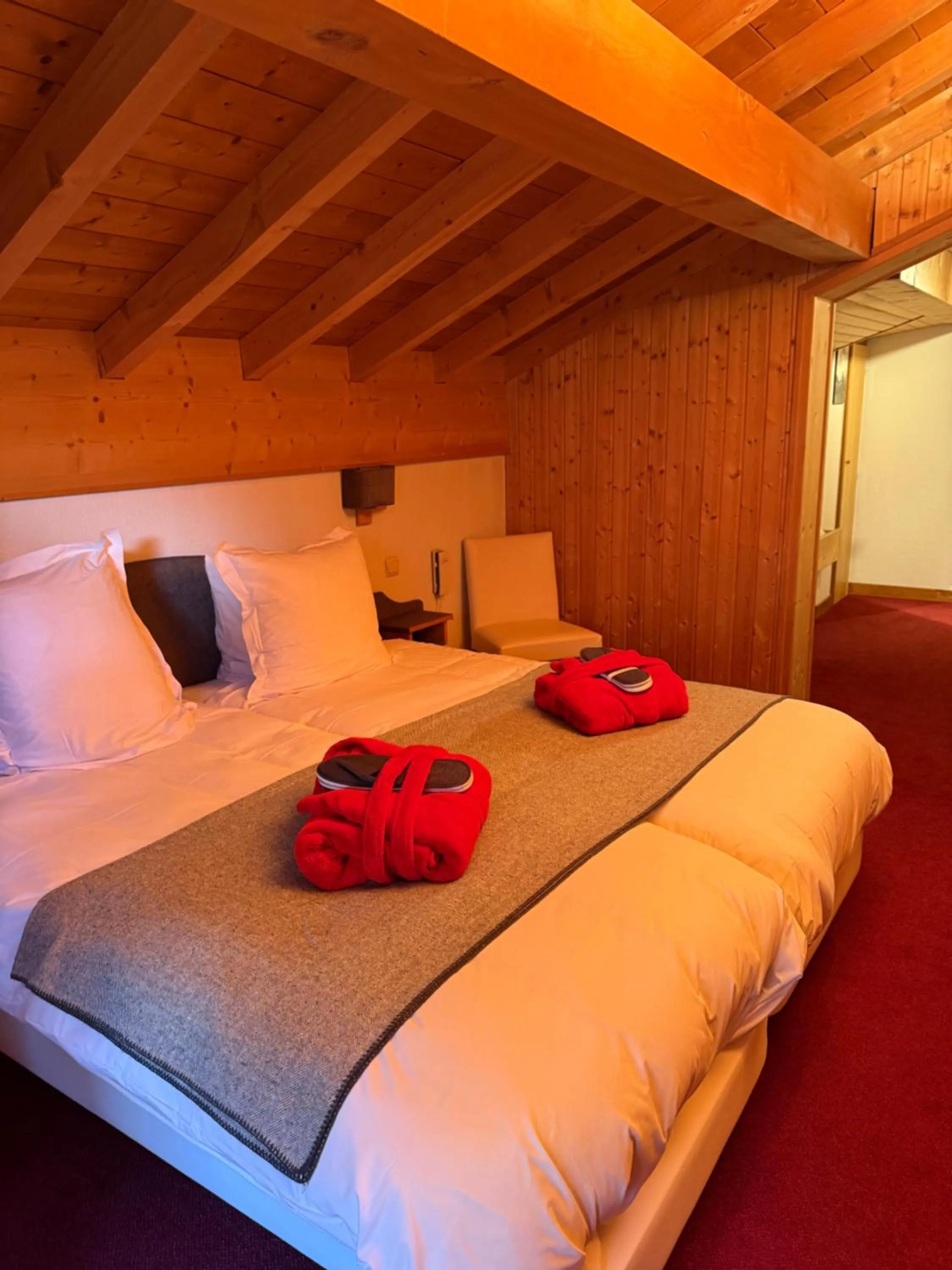 Bed in Hotel Bel'alpe