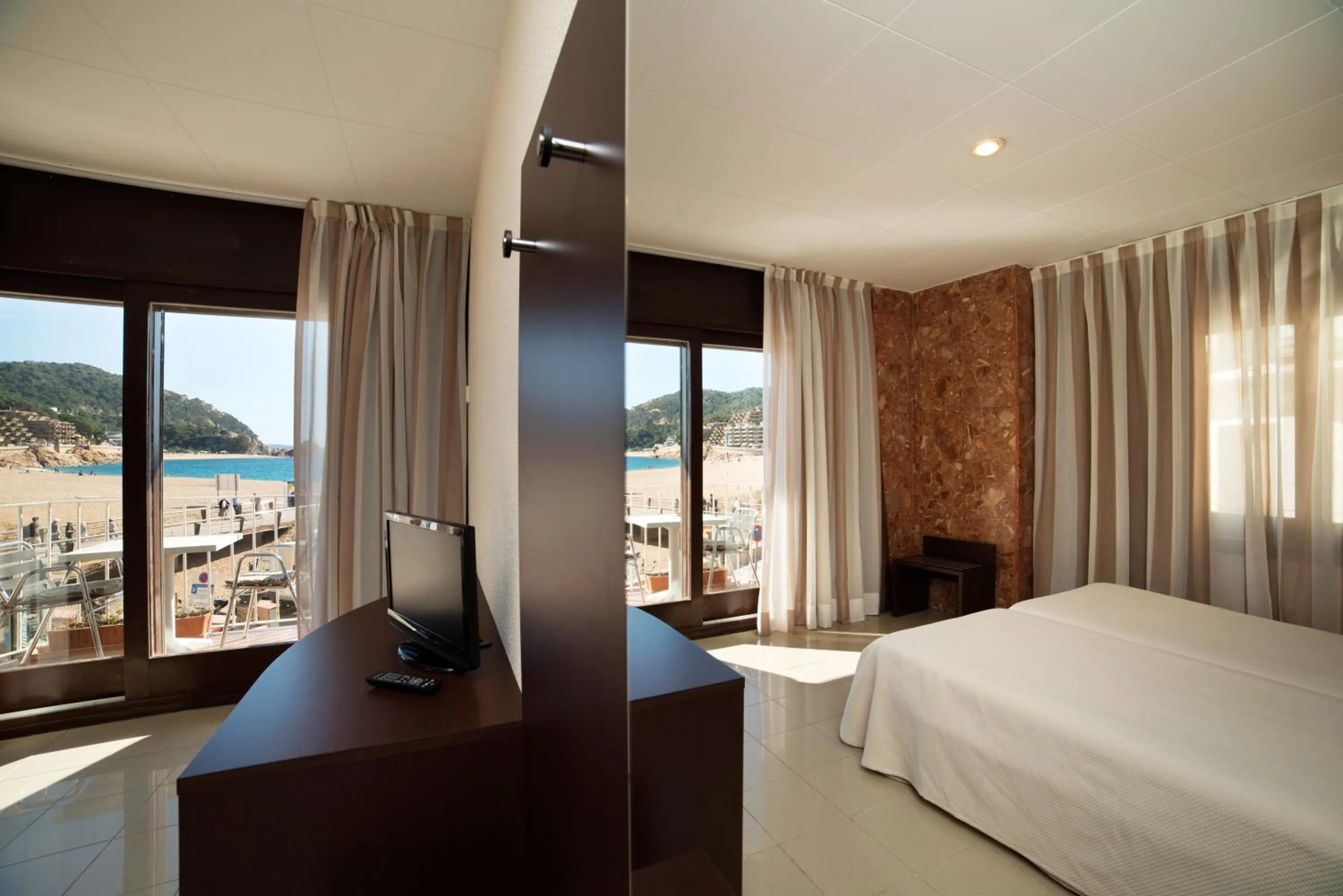 Bed in Hotel Capri