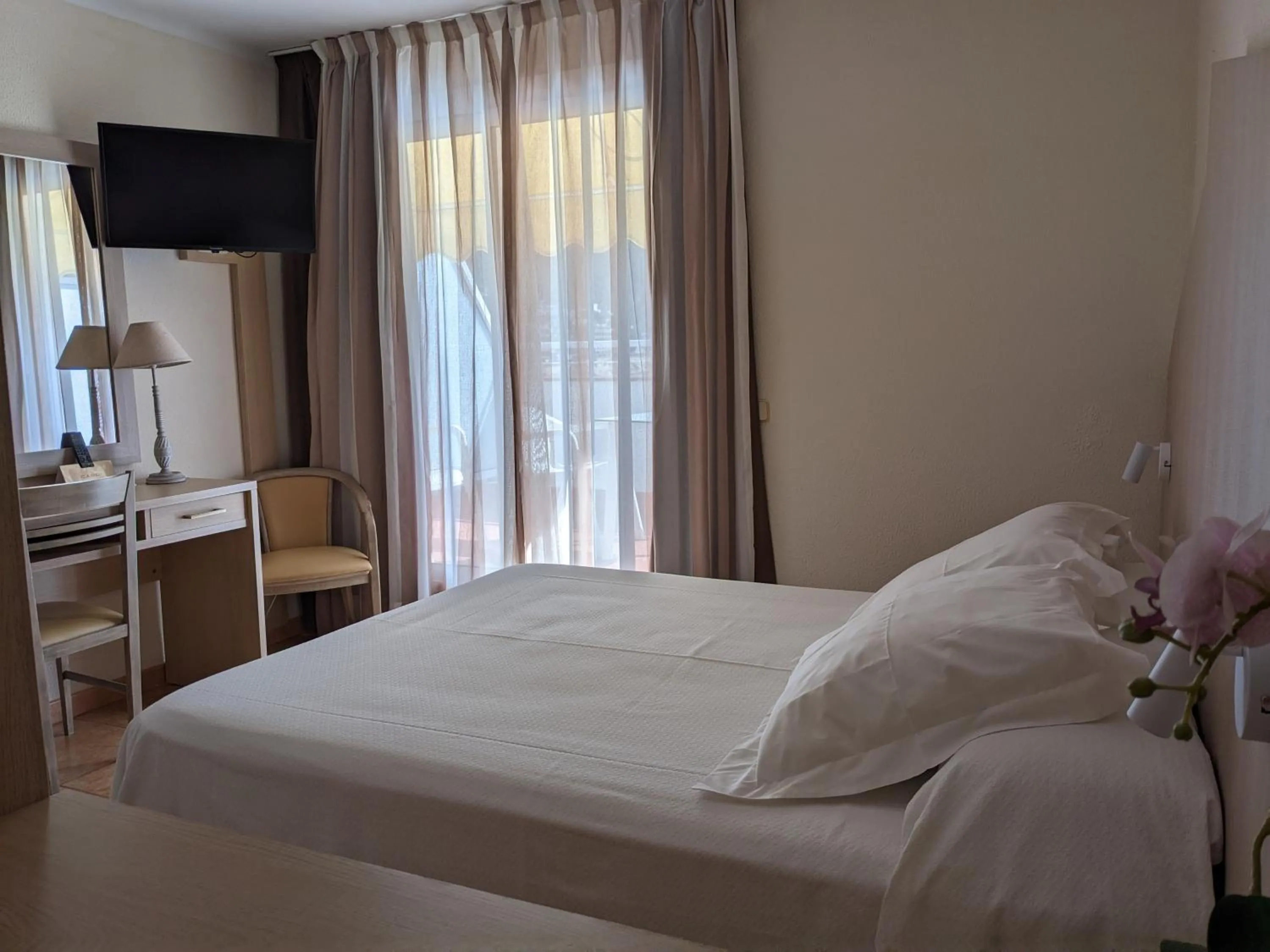 Bed in Hotel Capri