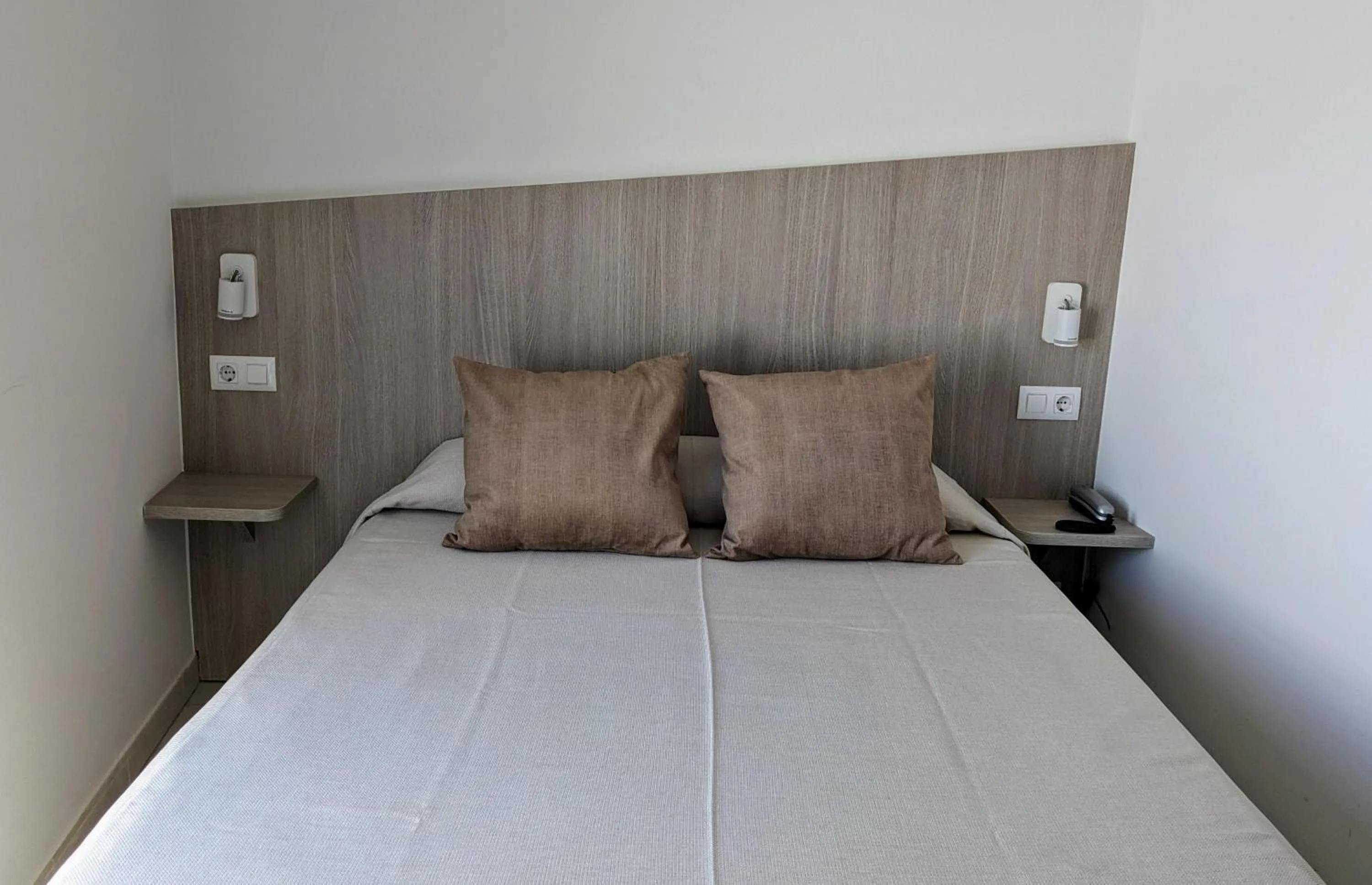 Bed in Hotel Capri
