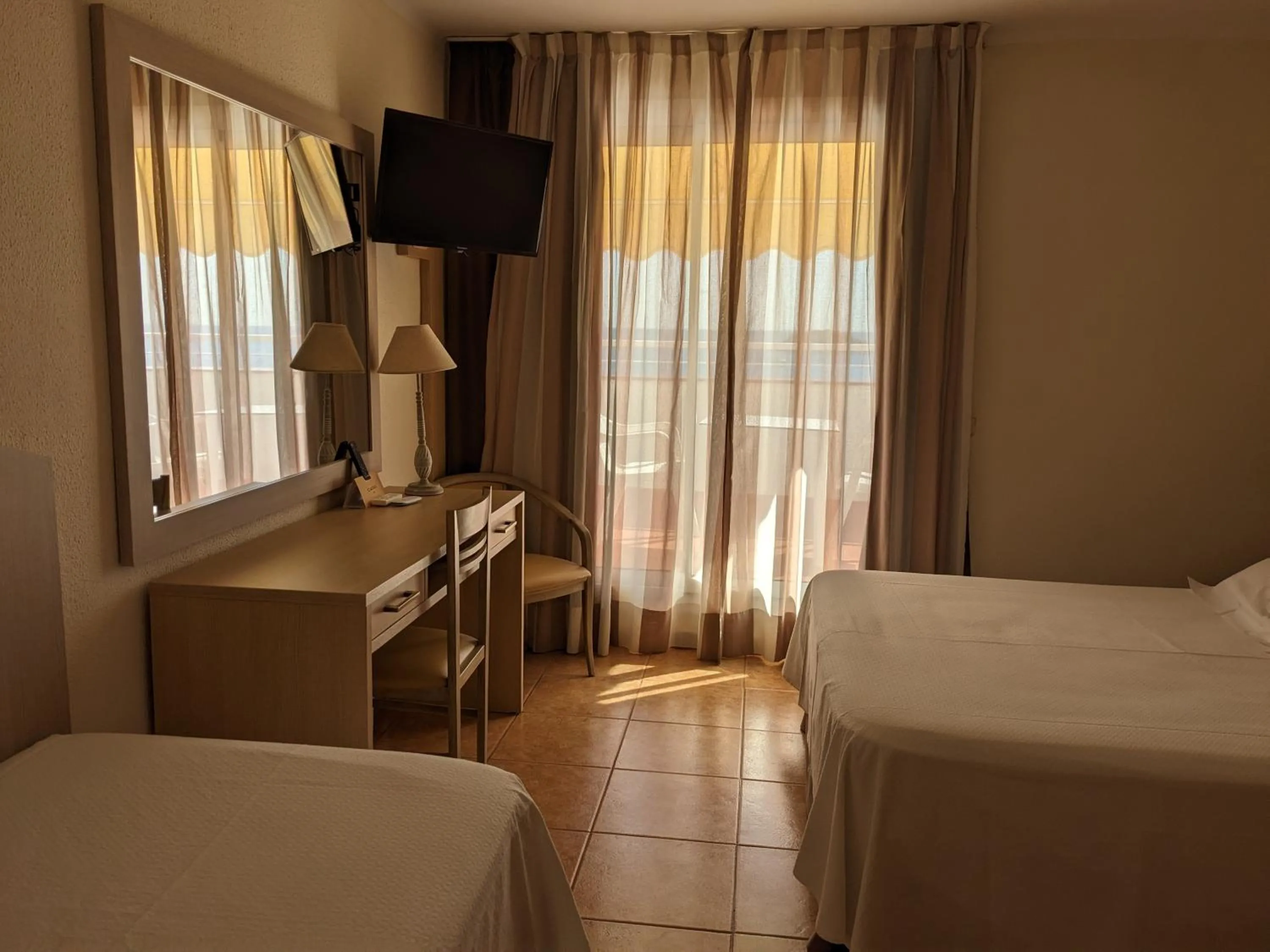 Bed in Hotel Capri