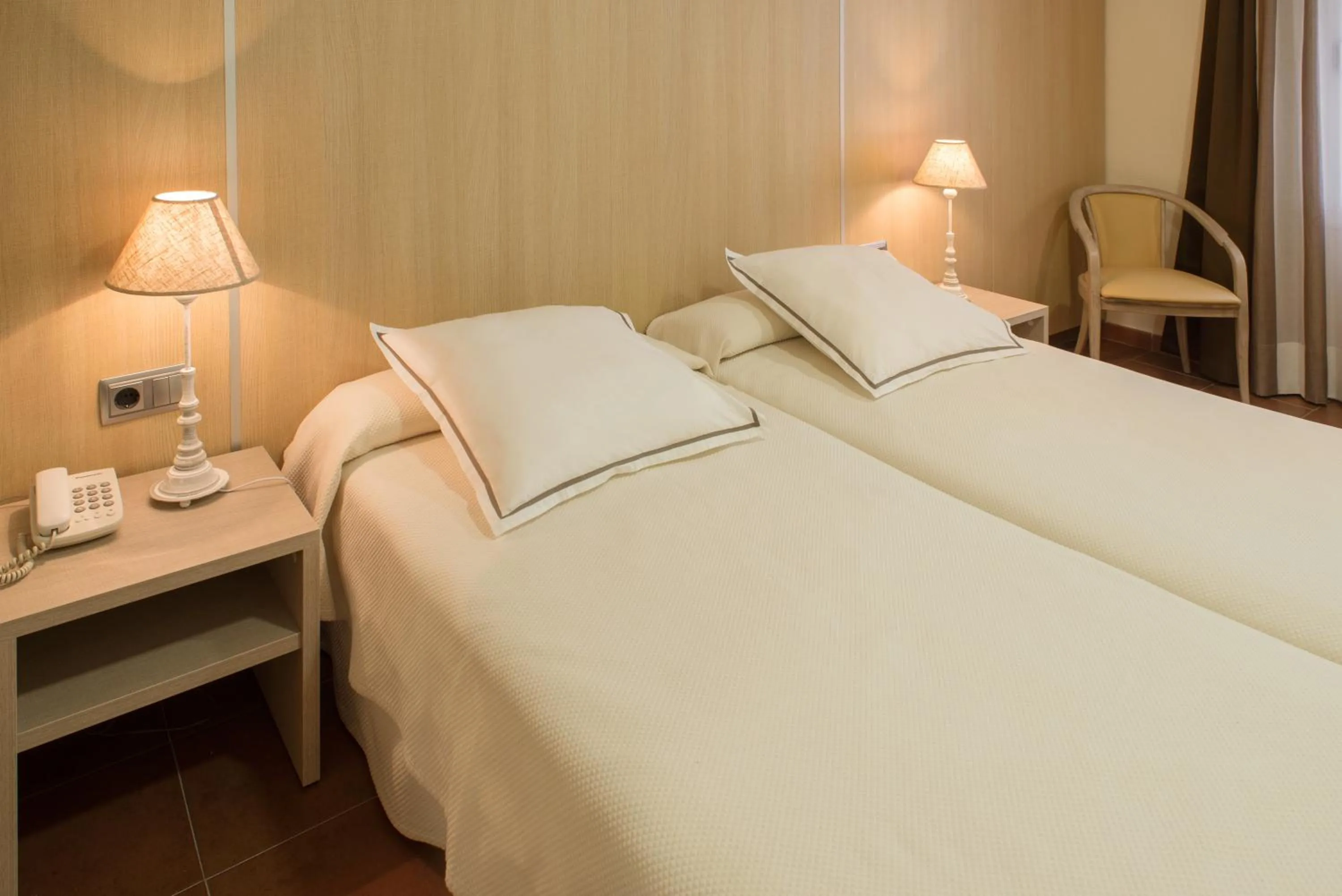 Bed in Hotel Capri