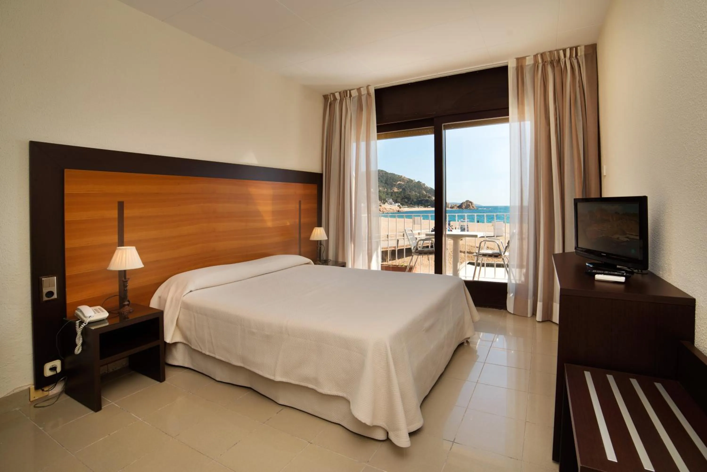 Bed in Hotel Capri