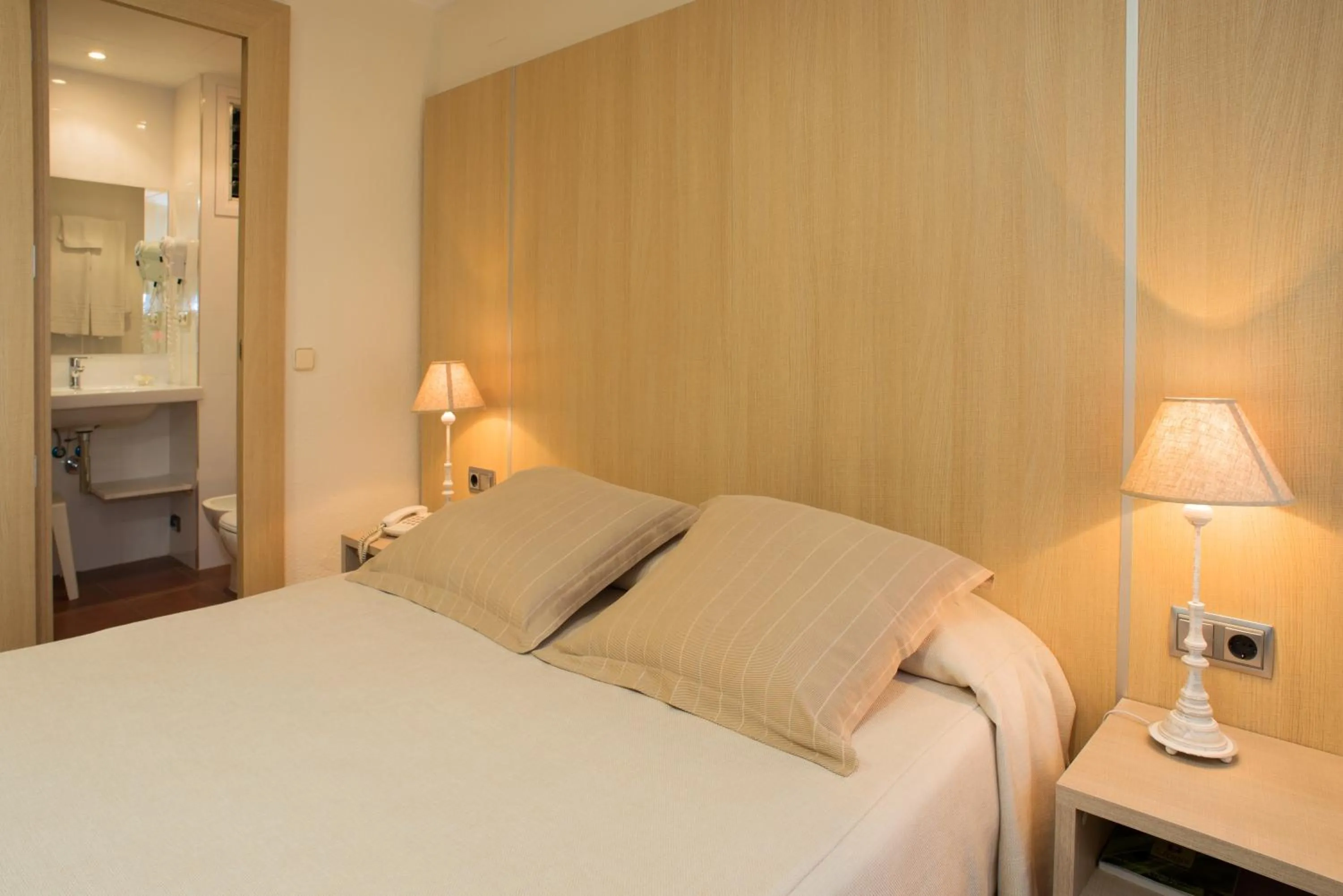 Bed in Hotel Capri