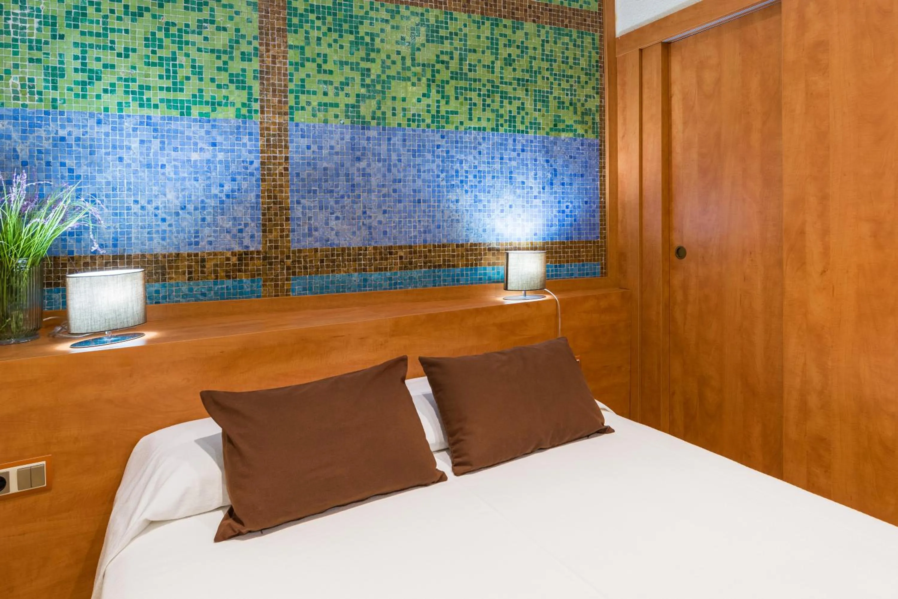 Bed in Hotel Capri