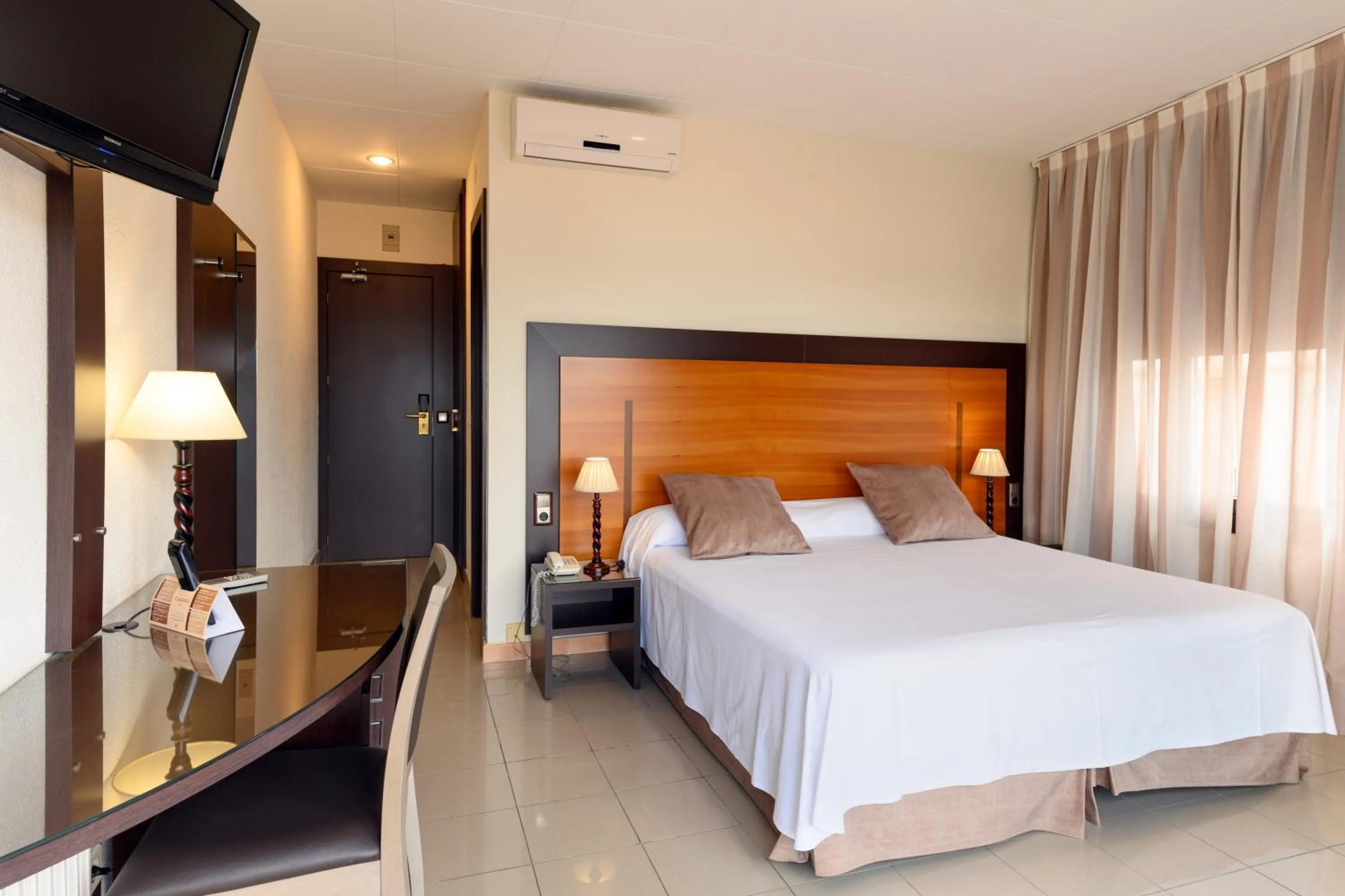 TV and multimedia, Bed in Hotel Capri