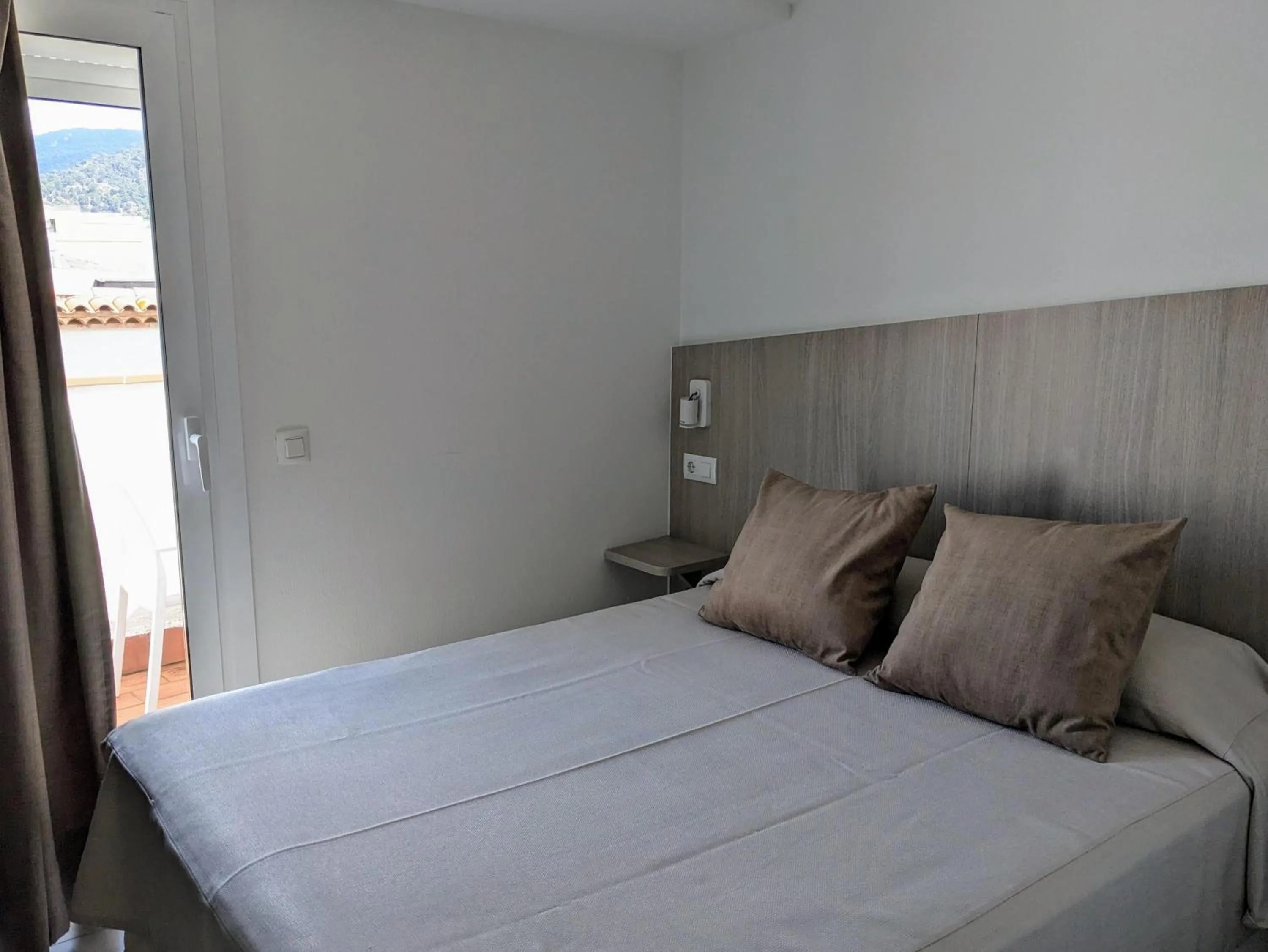 Bed in Hotel Capri