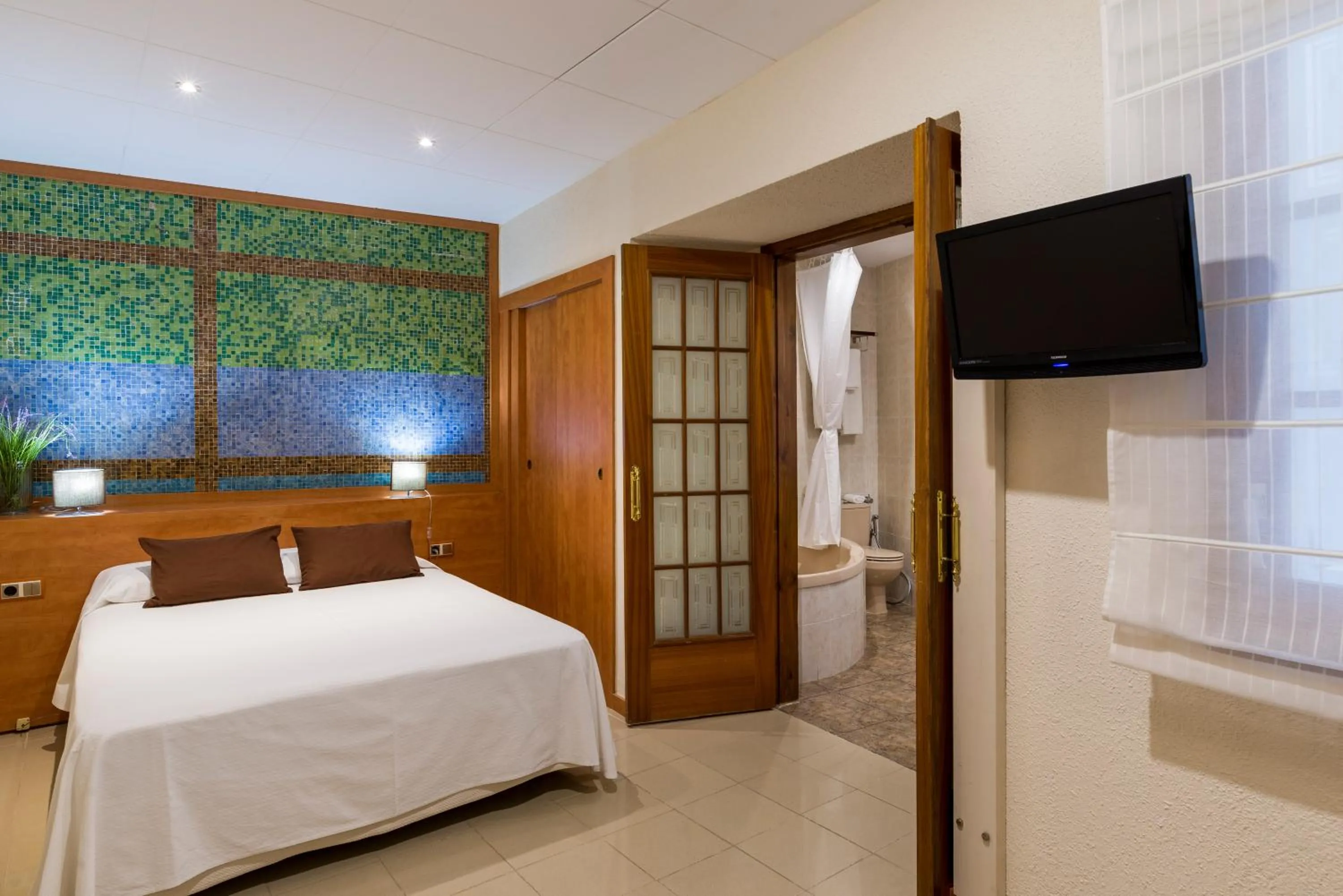 Bed in Hotel Capri
