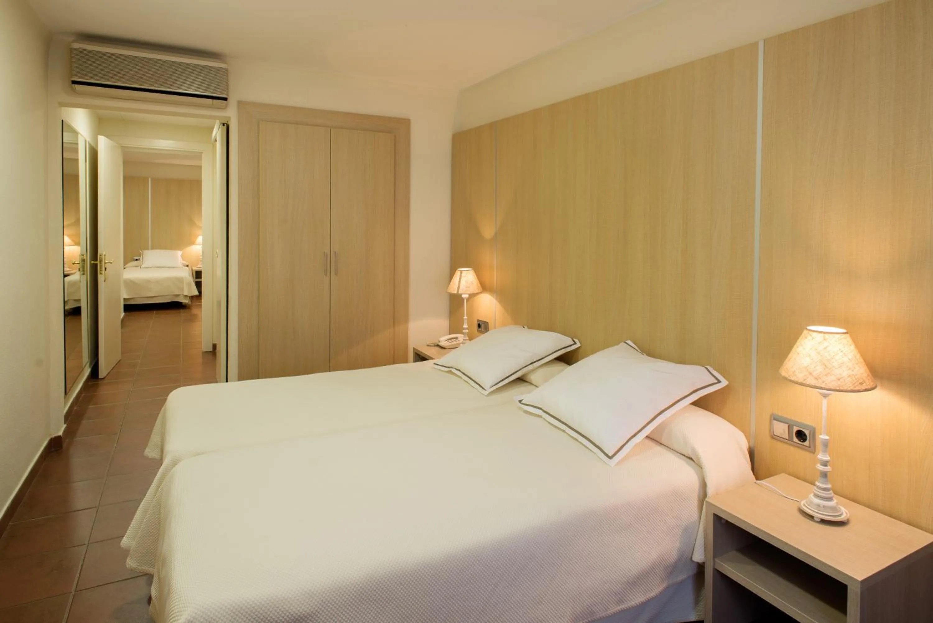 Bed in Hotel Capri