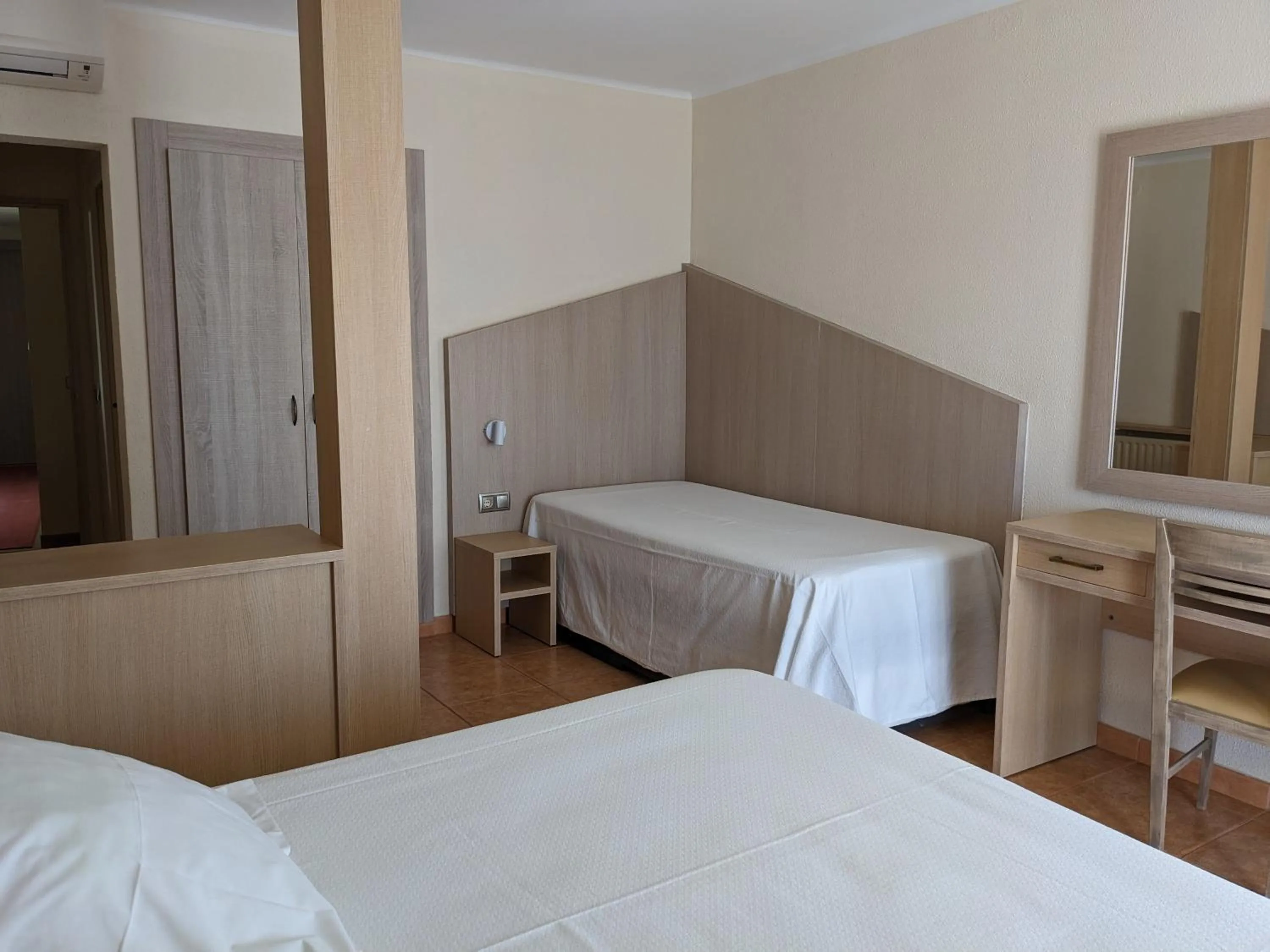 Bed in Hotel Capri