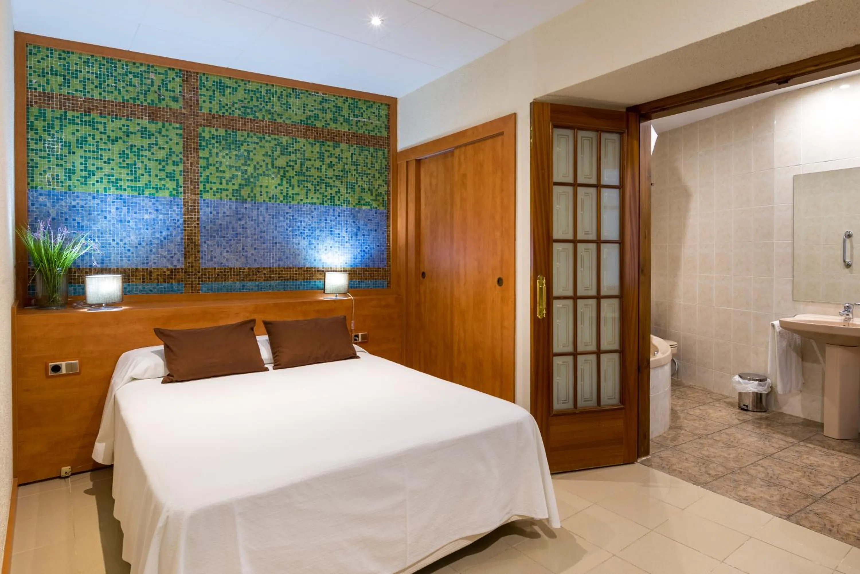 Bed in Hotel Capri