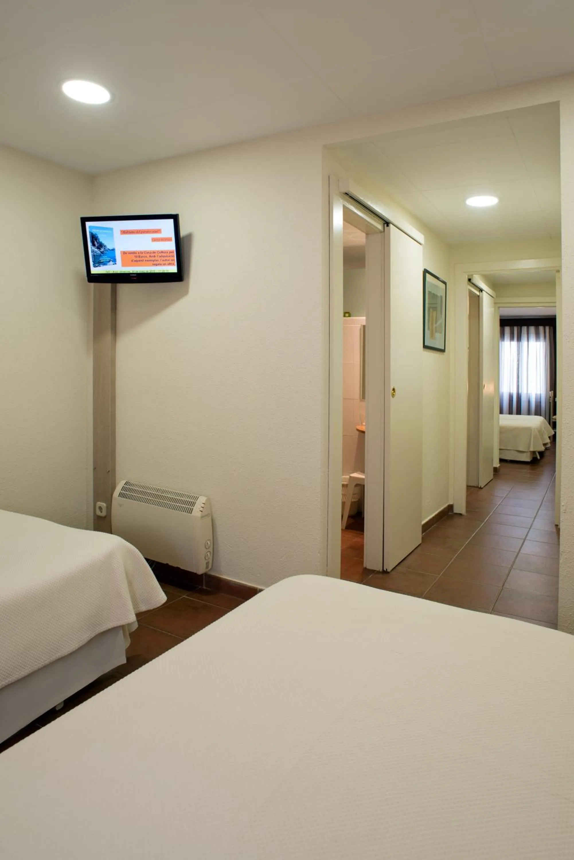 Bed in Hotel Capri