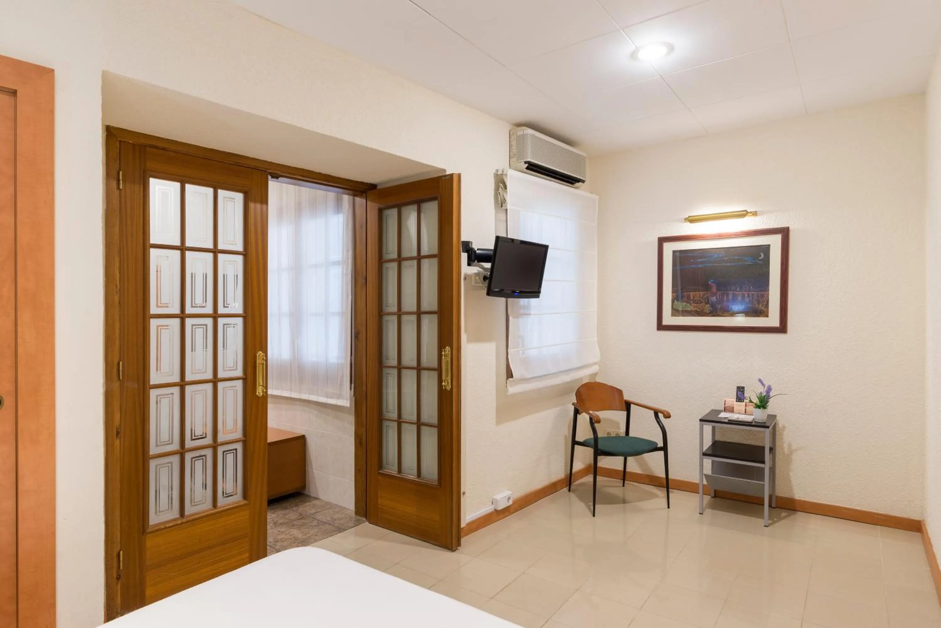 TV and multimedia, Bed in Hotel Capri