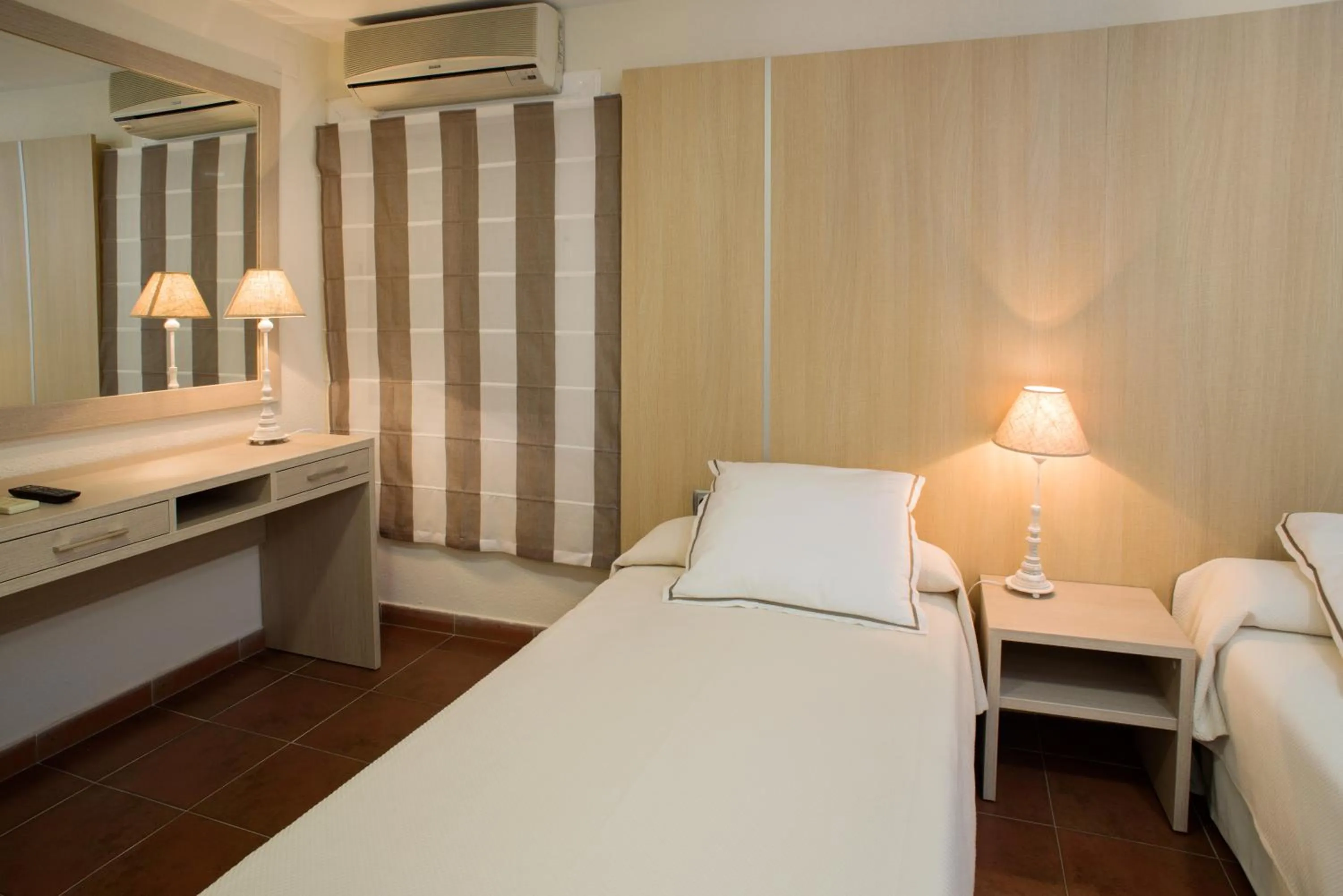 Bed in Hotel Capri