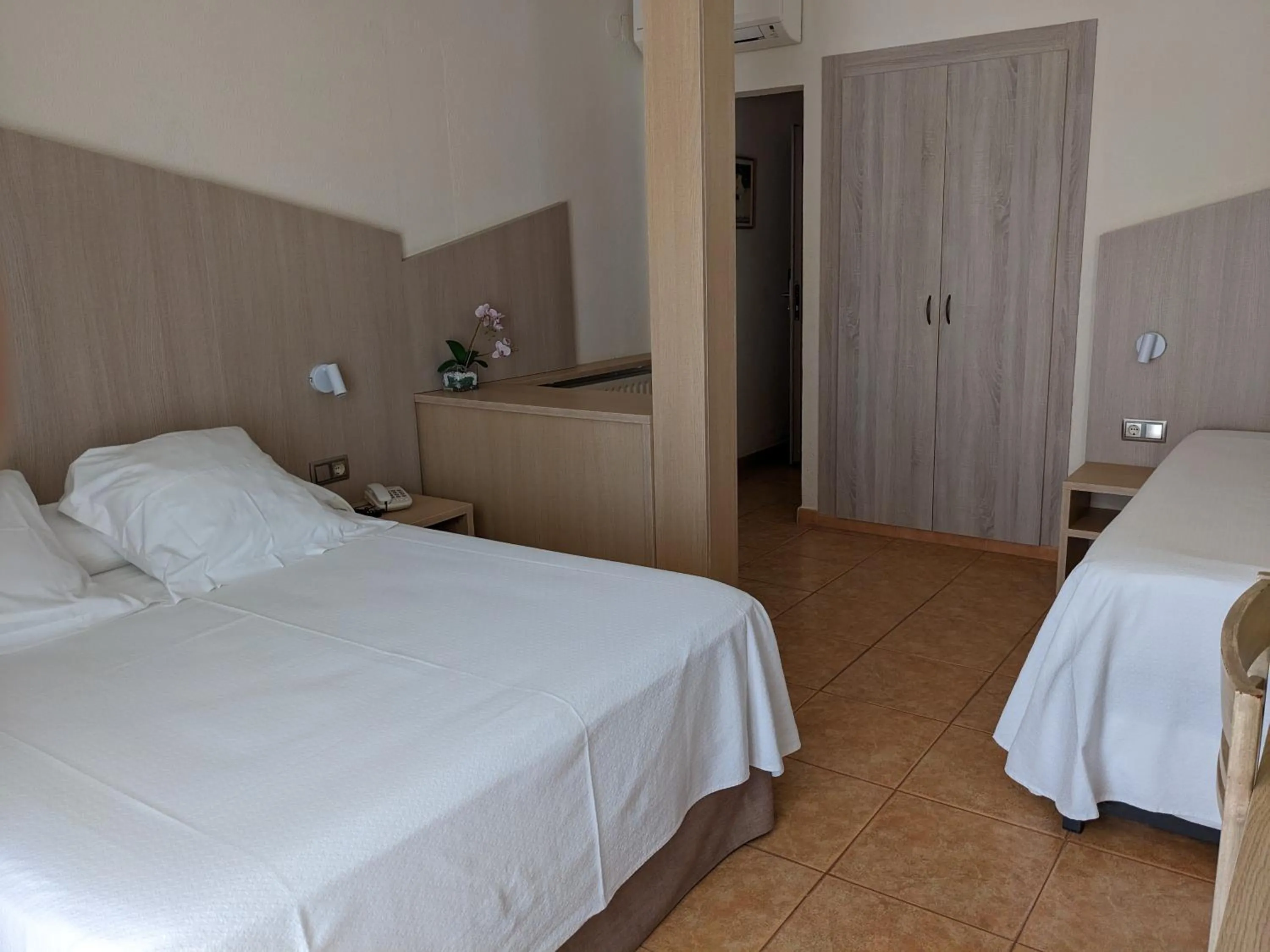 Bed in Hotel Capri