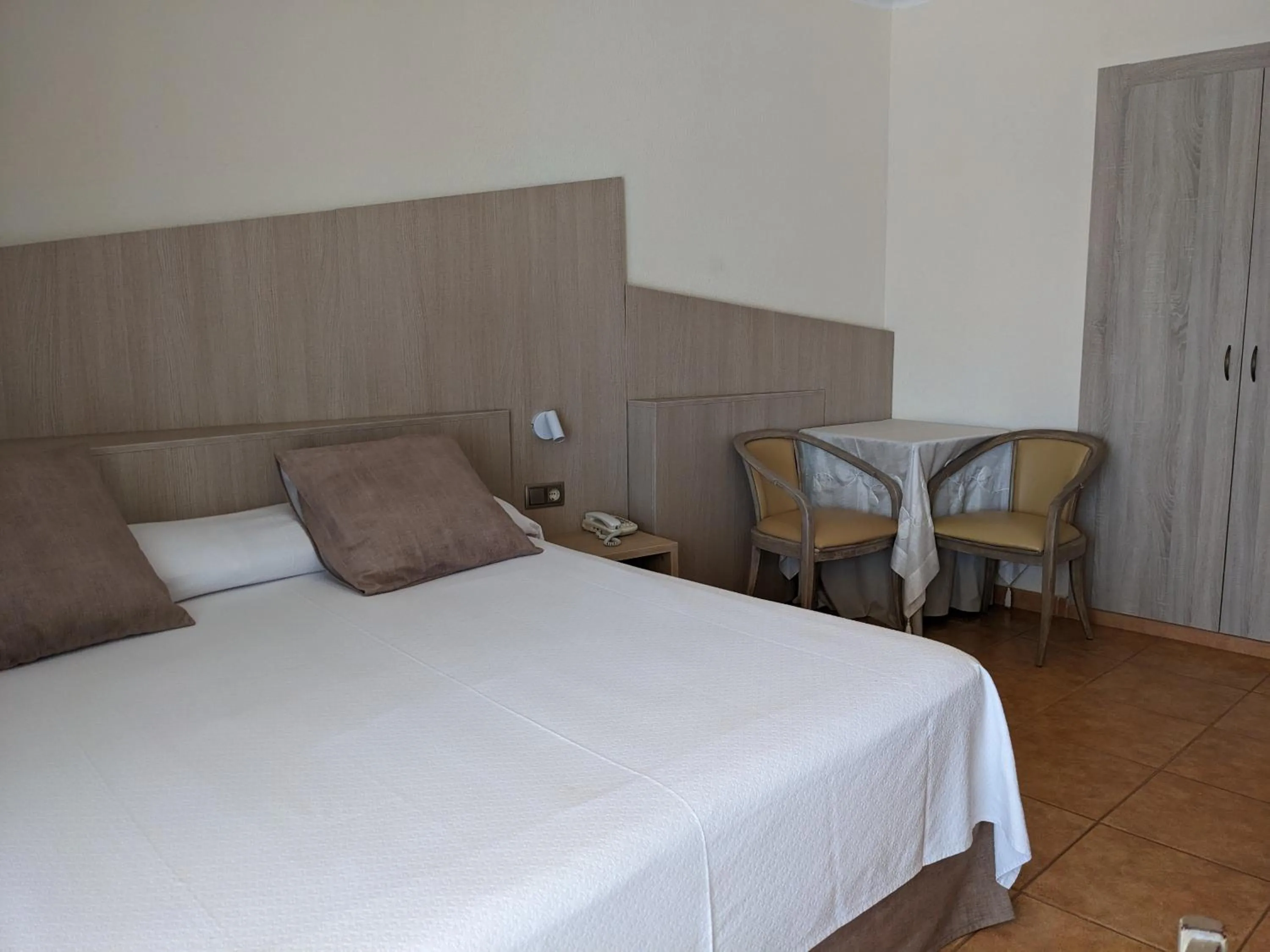 Bed in Hotel Capri