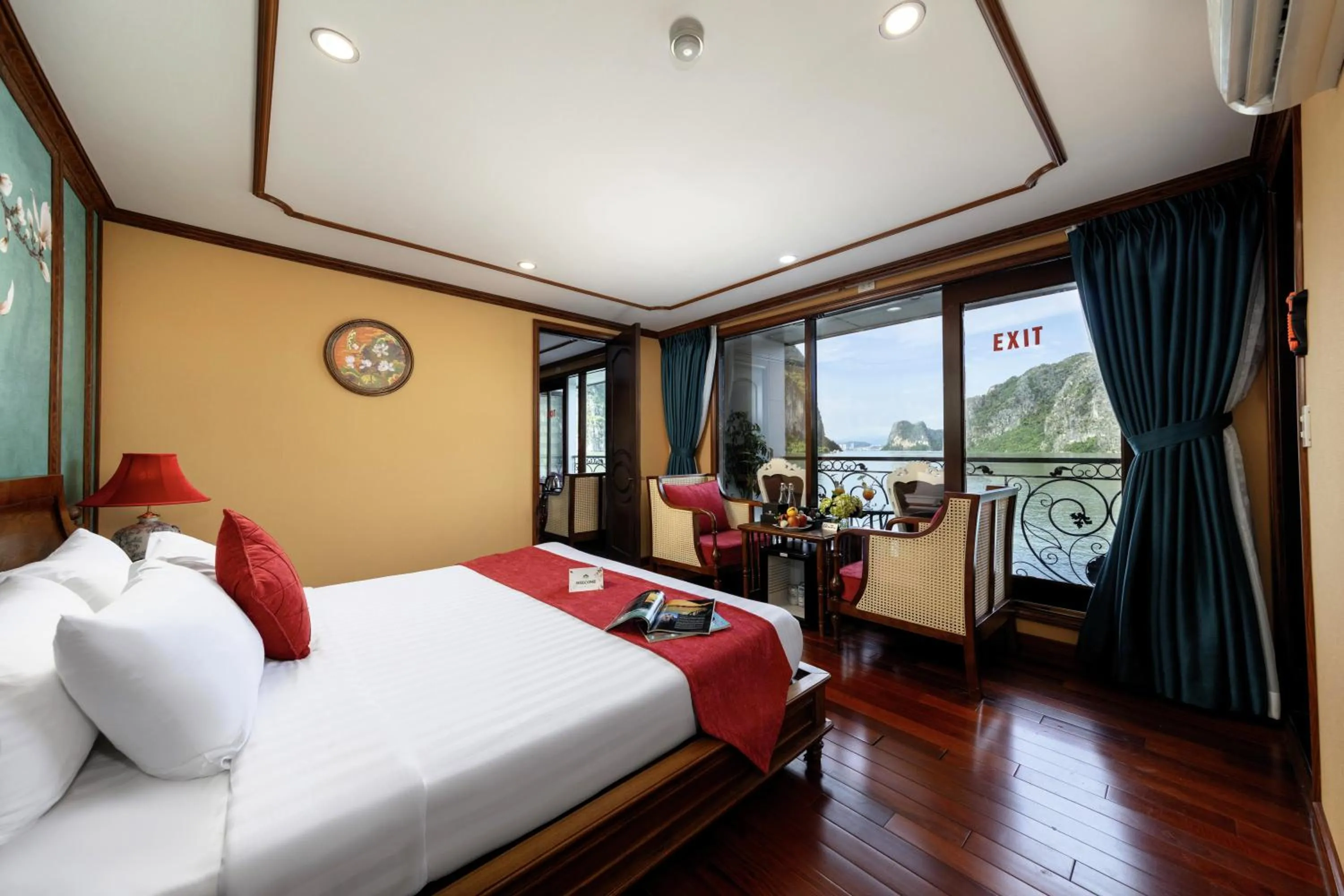 Photo of the whole room, Bed in Verdure Lotus Grandeur Cruise on Ha Long Bay