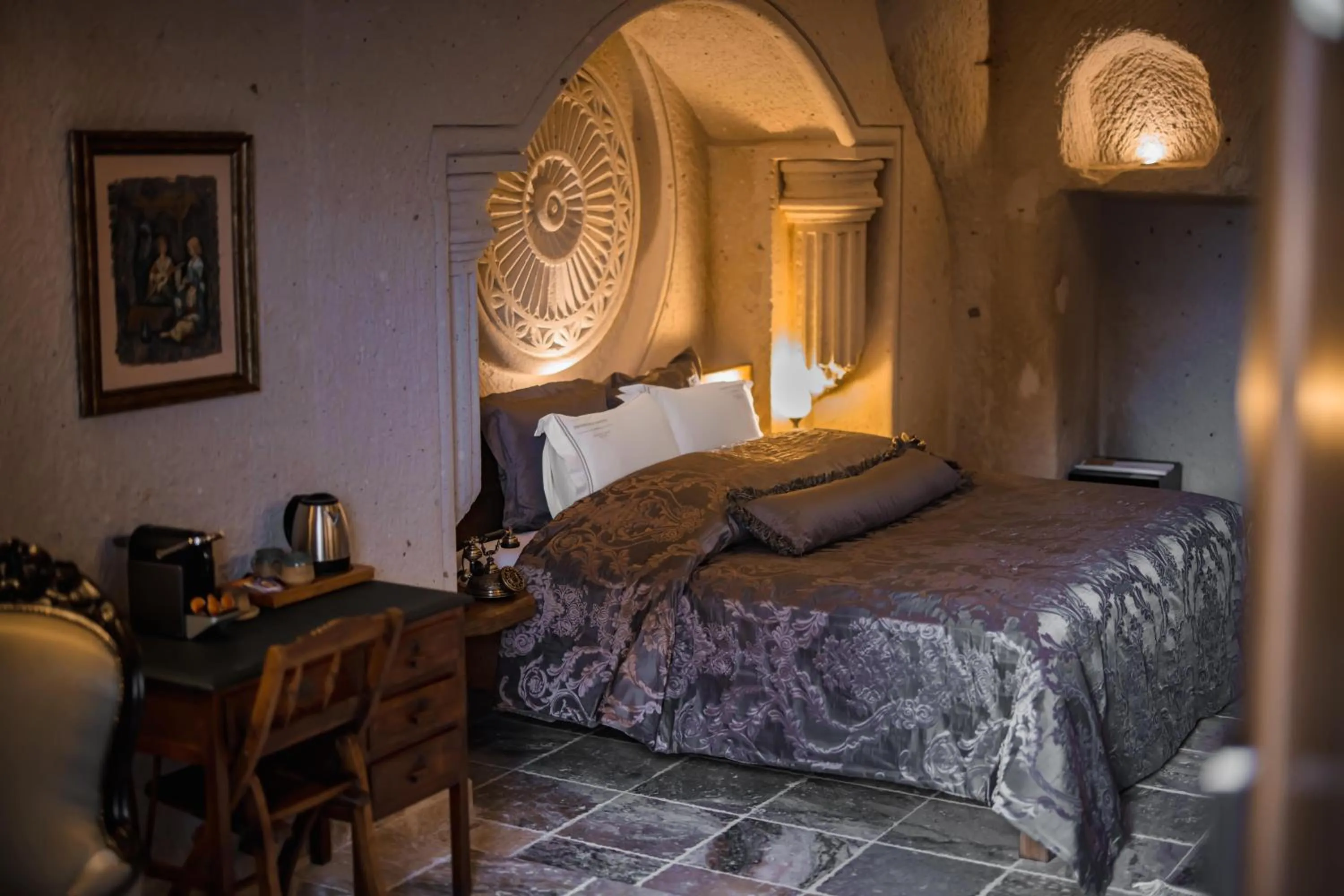 Bed in The Kingdom Of Cappadocia Luxury Cave Hotel