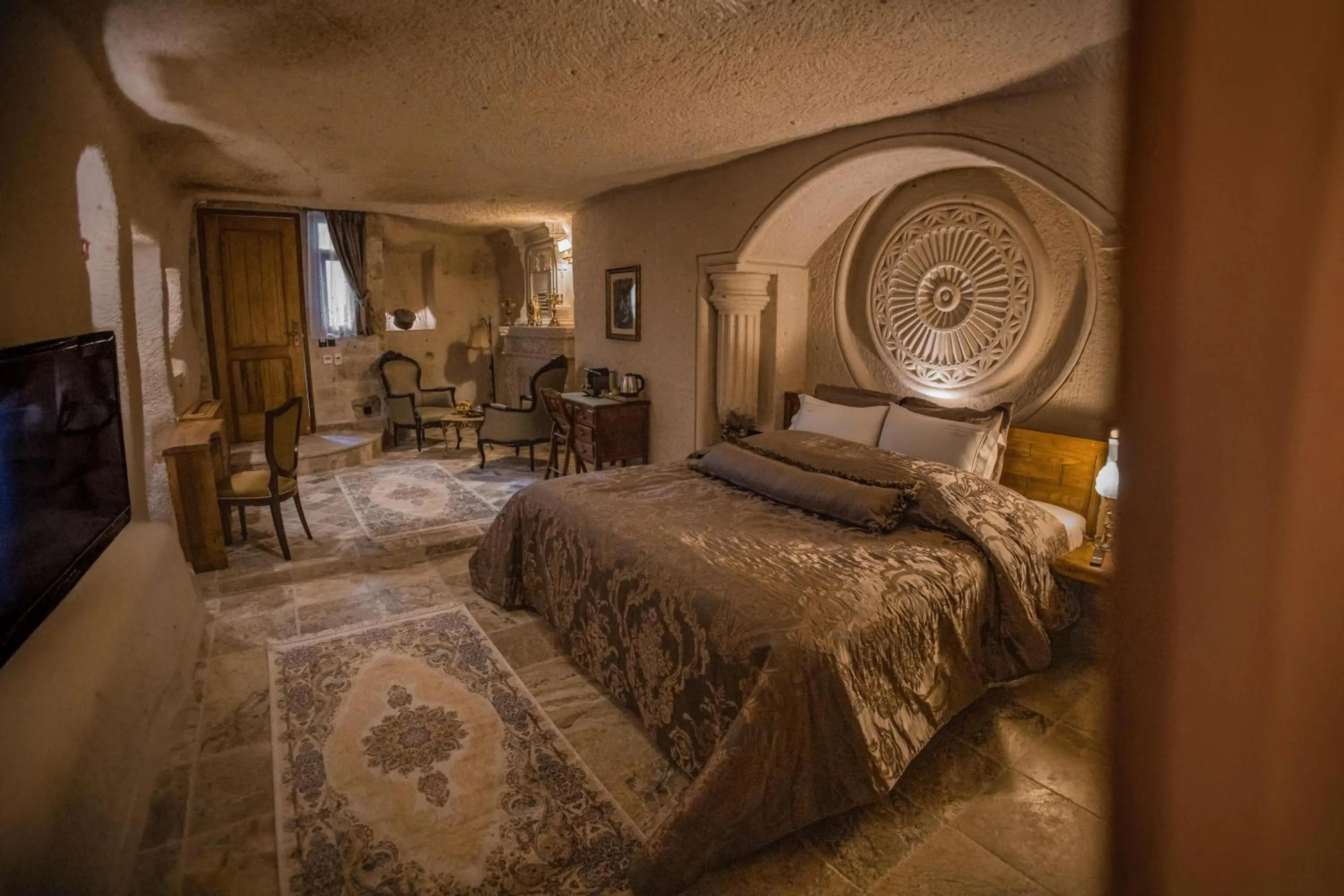 Bed in The Kingdom Of Cappadocia Luxury Cave Hotel