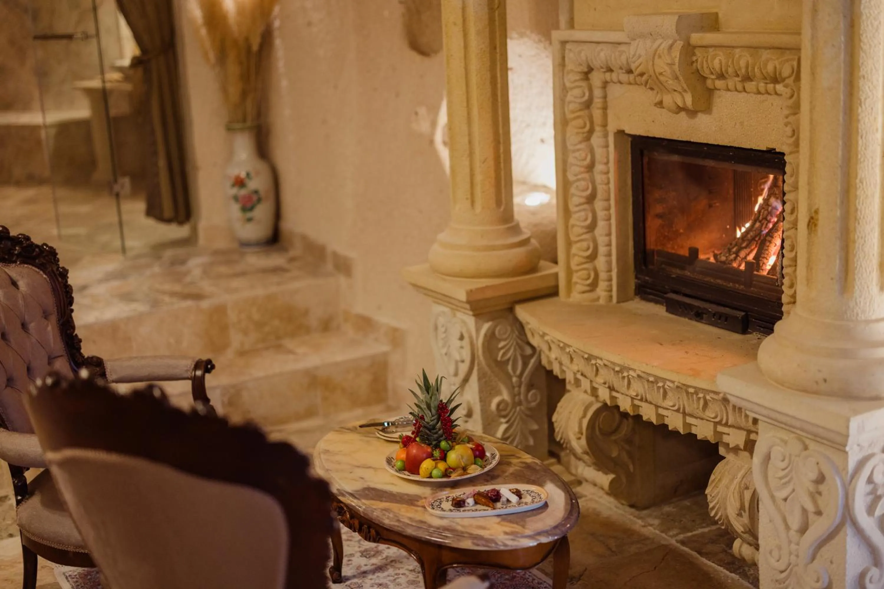 fireplace in The Kingdom Of Cappadocia Luxury Cave Hotel