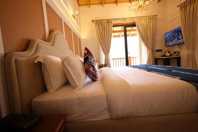 Bed in Foxoso Aaristo Baga Beach Resort