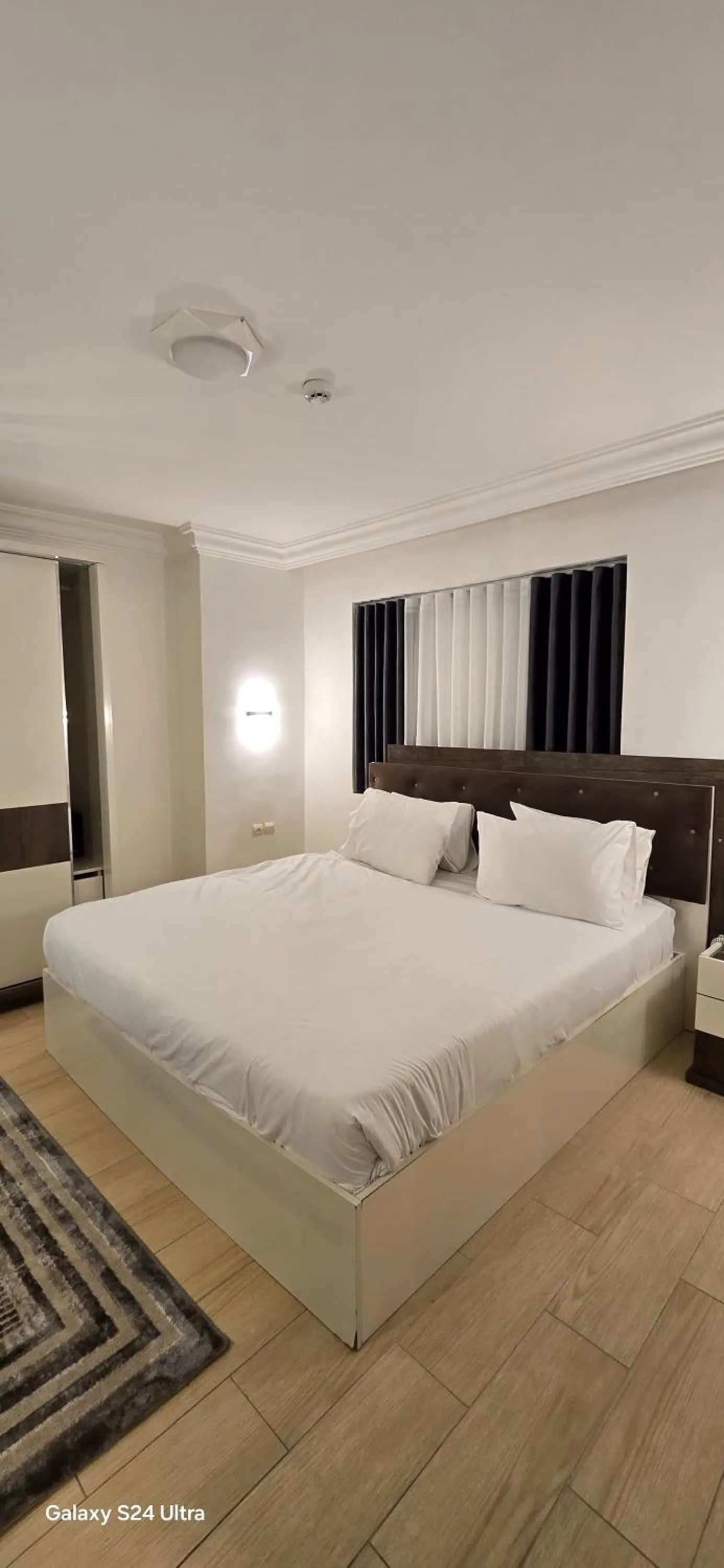 Bed in Balcony Hotel