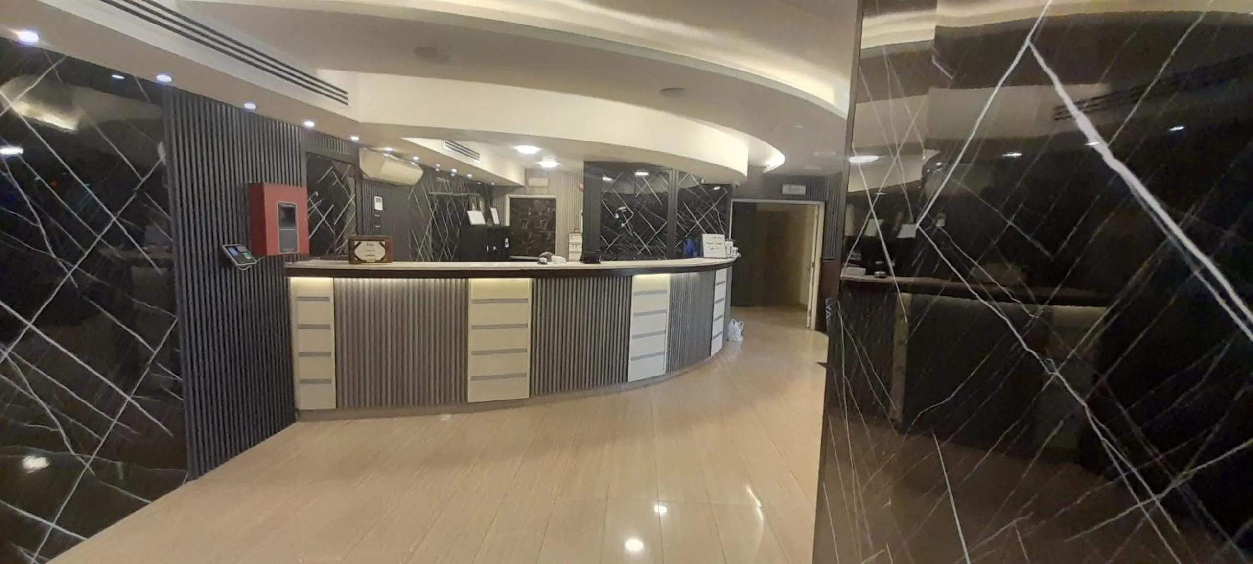 Lobby or reception in Balcony Hotel