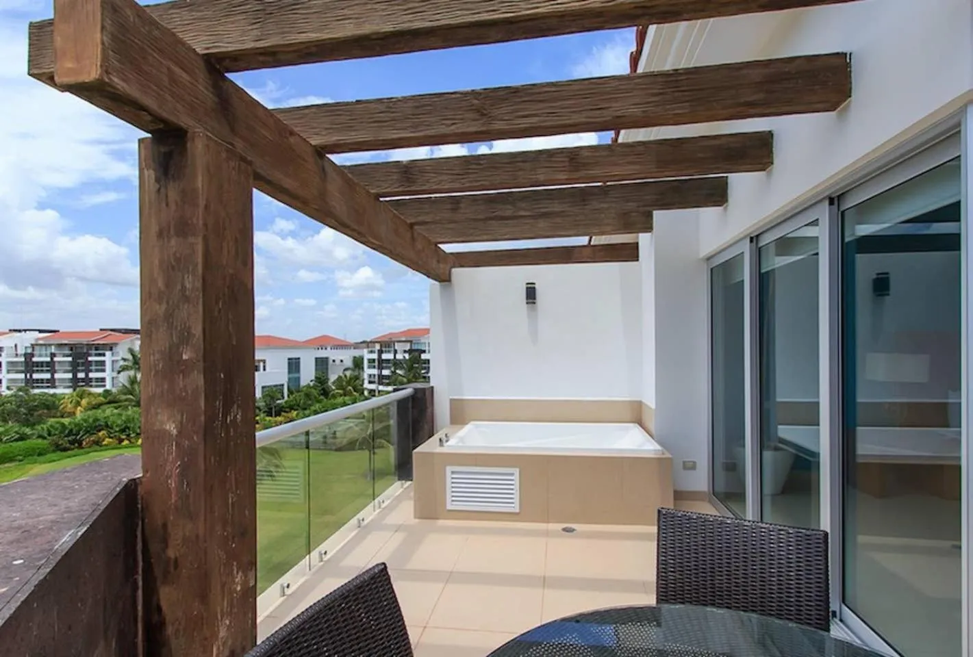 Property building in Luxury Condos at Mareazul Beachfront Complex with Resort-Style Amenities