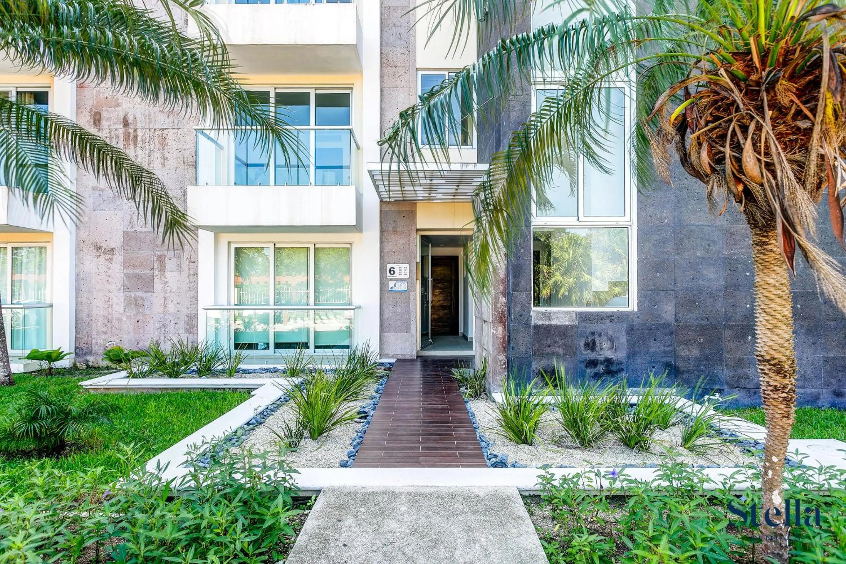 Property building in Luxury Condos at Mareazul Beachfront Complex with Resort-Style Amenities