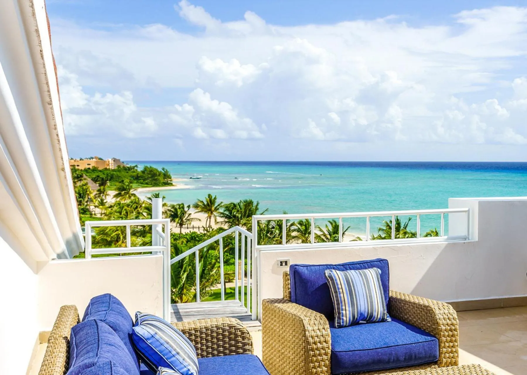 Patio in Luxury Condos at Mareazul Beachfront Complex with Resort-Style Amenities