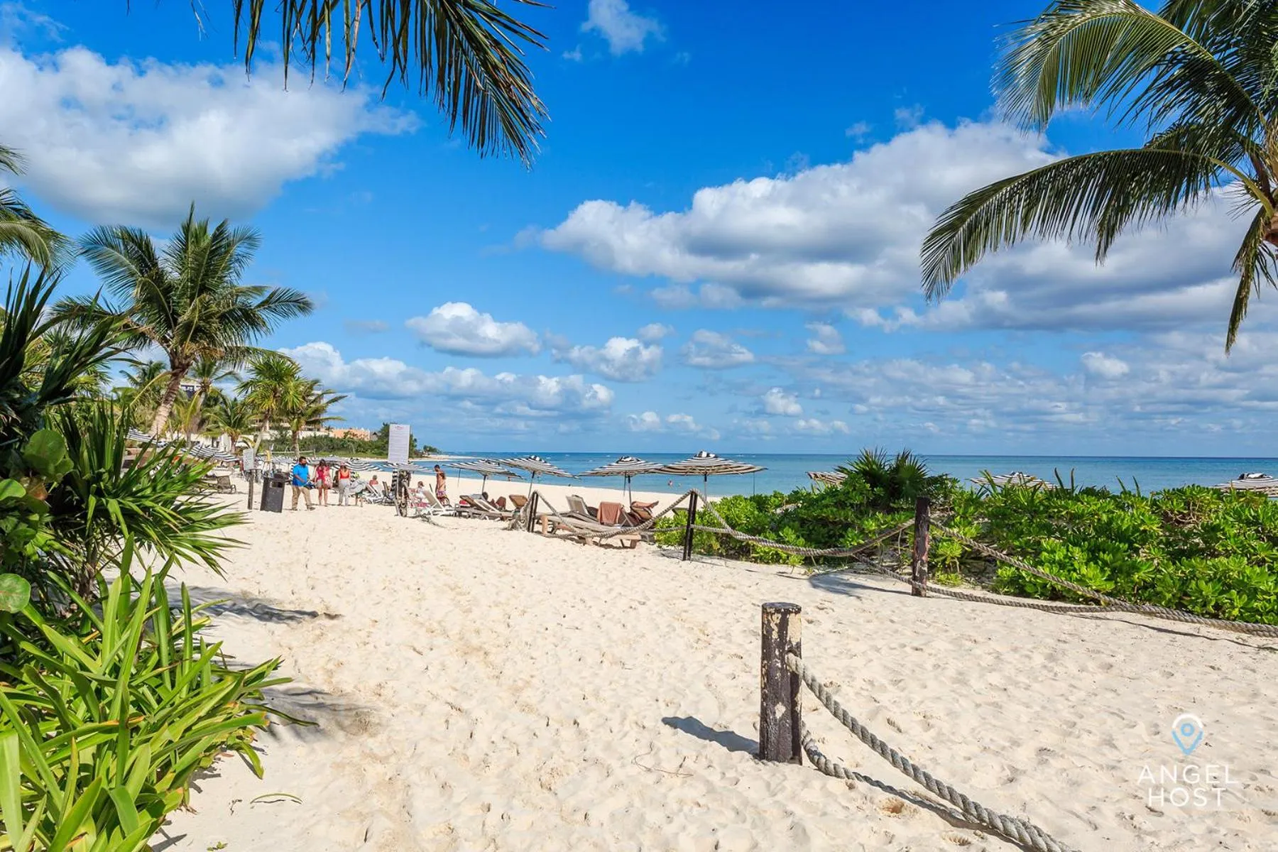 Beach in Luxury Condos at Mareazul Beachfront Complex with Resort-Style Amenities