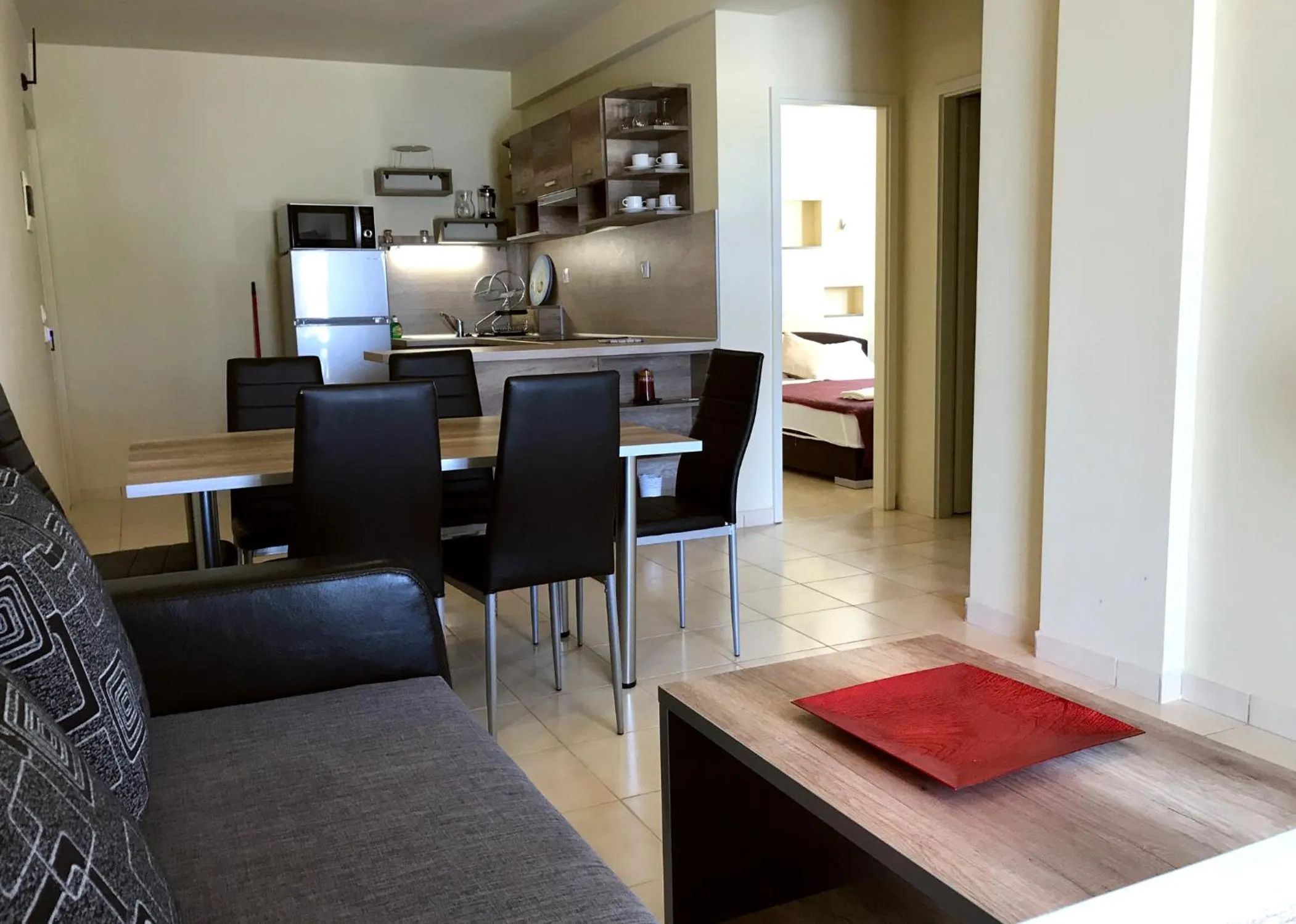 Kitchen or kitchenette, Bed in Catamaran Corfu Aparthotel