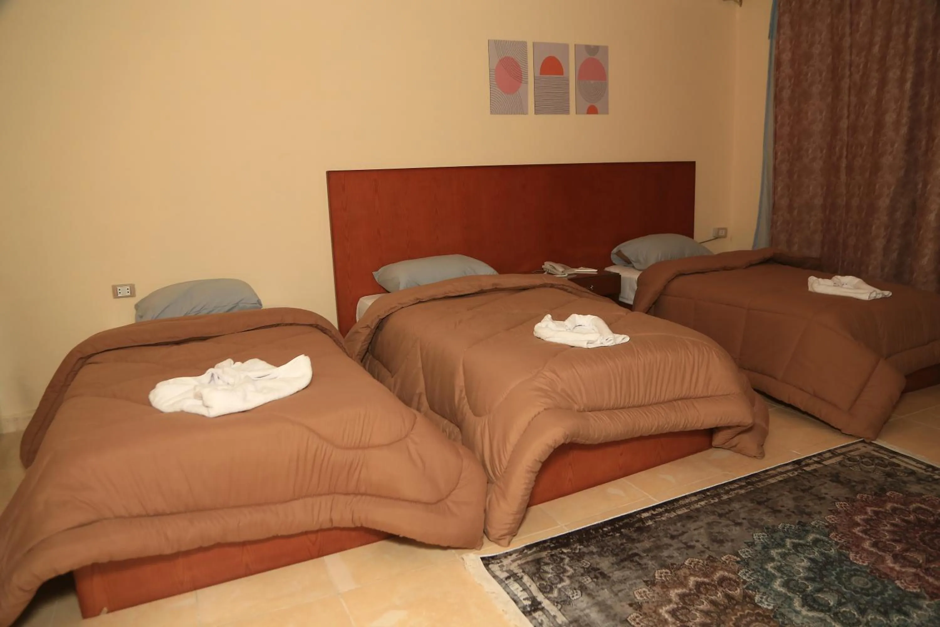 Bed in Verssailles Pyramids Hotel