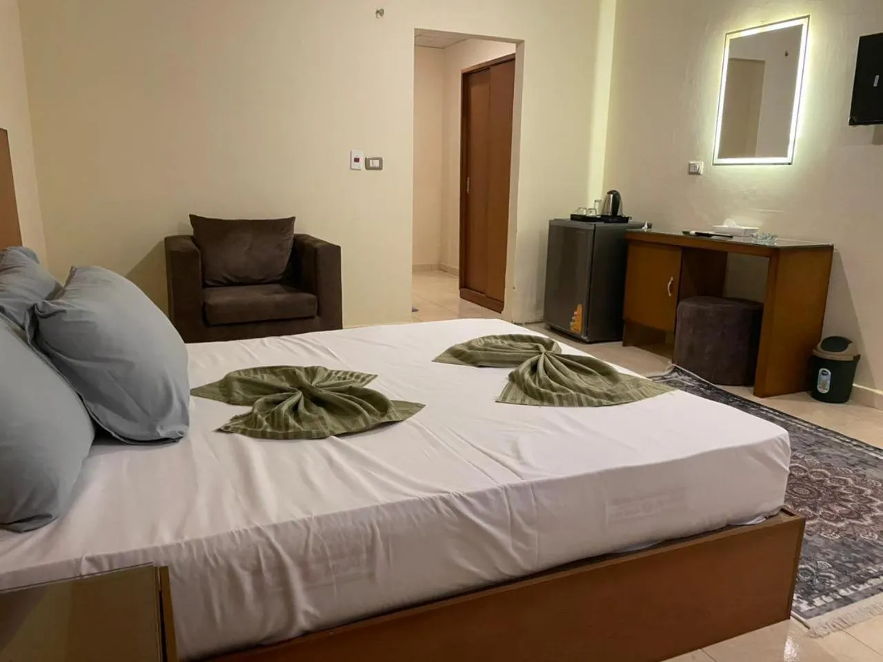 Bed in Verssailles Pyramids Hotel