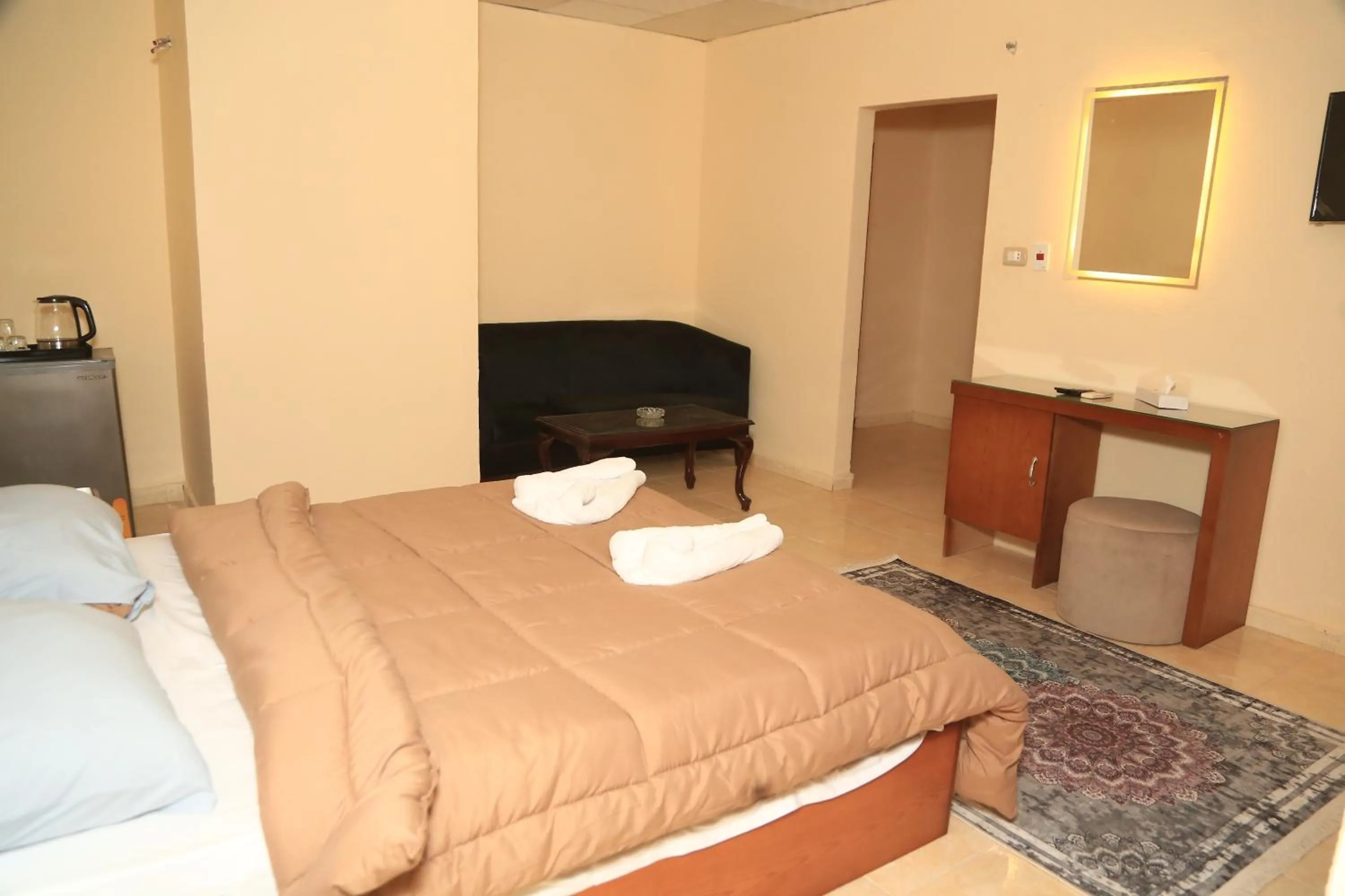 Bed in Verssailles Pyramids Hotel