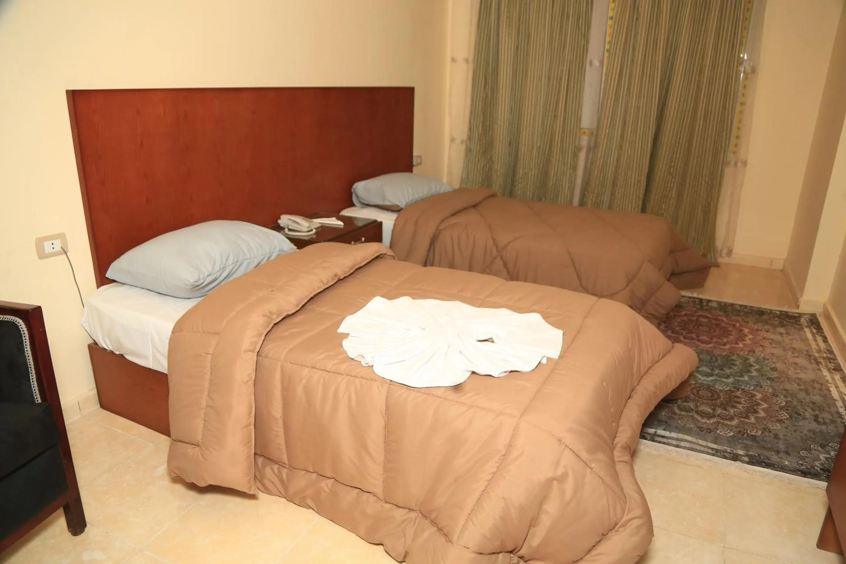 Bedroom in Verssailles Pyramids Hotel