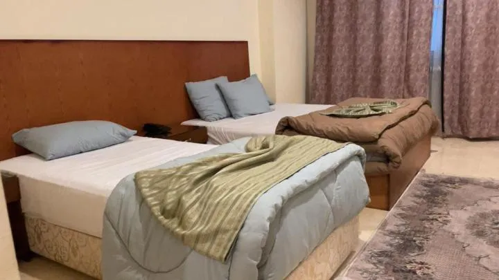 Bedroom in Verssailles Pyramids Hotel