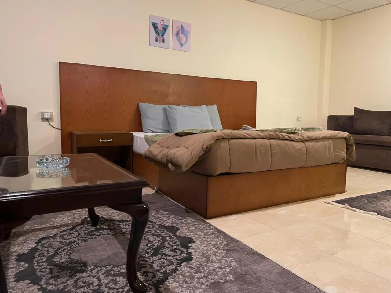 Bed in Verssailles Pyramids Hotel