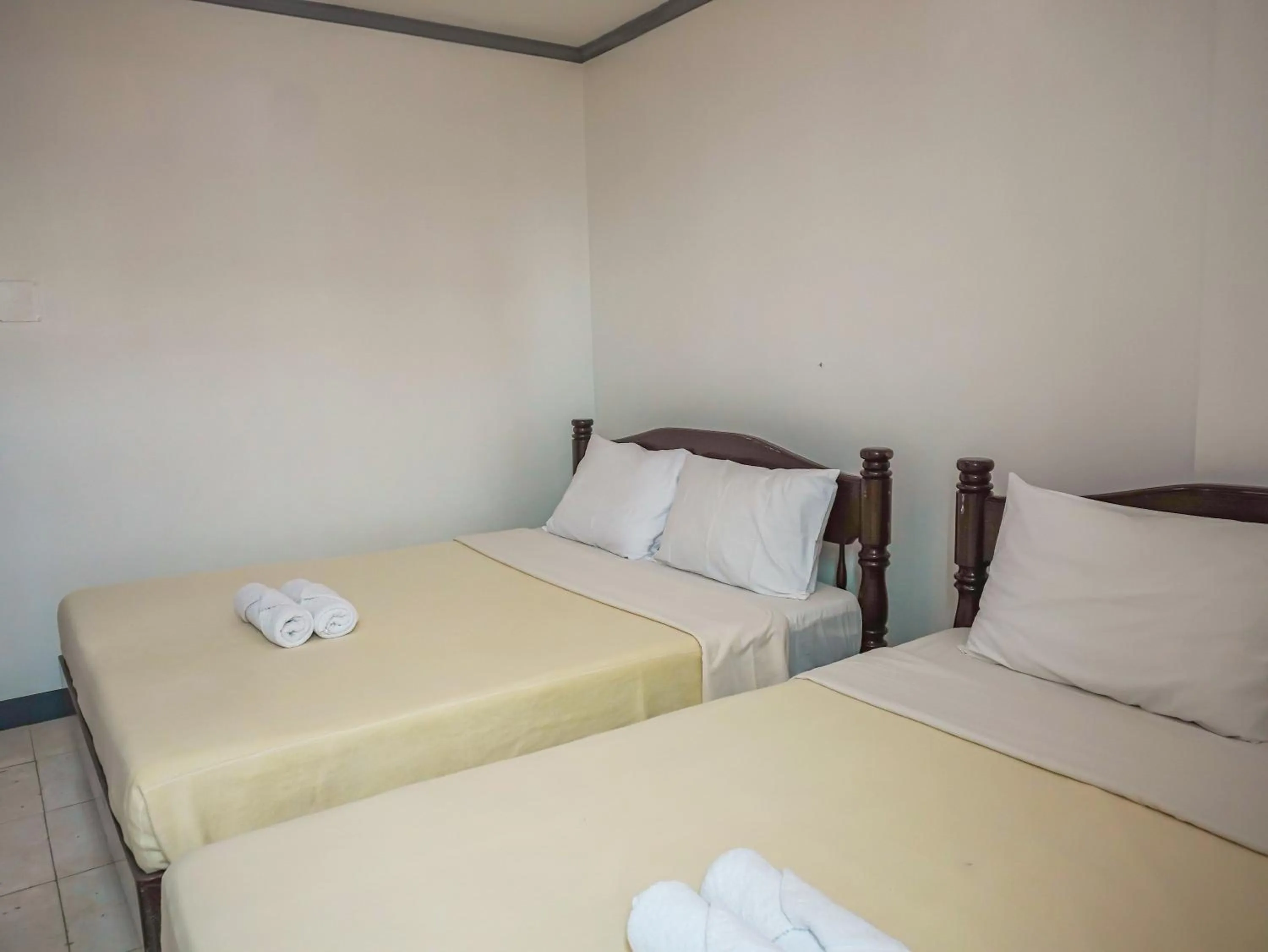 Bed in Boracay Paradise Hotel