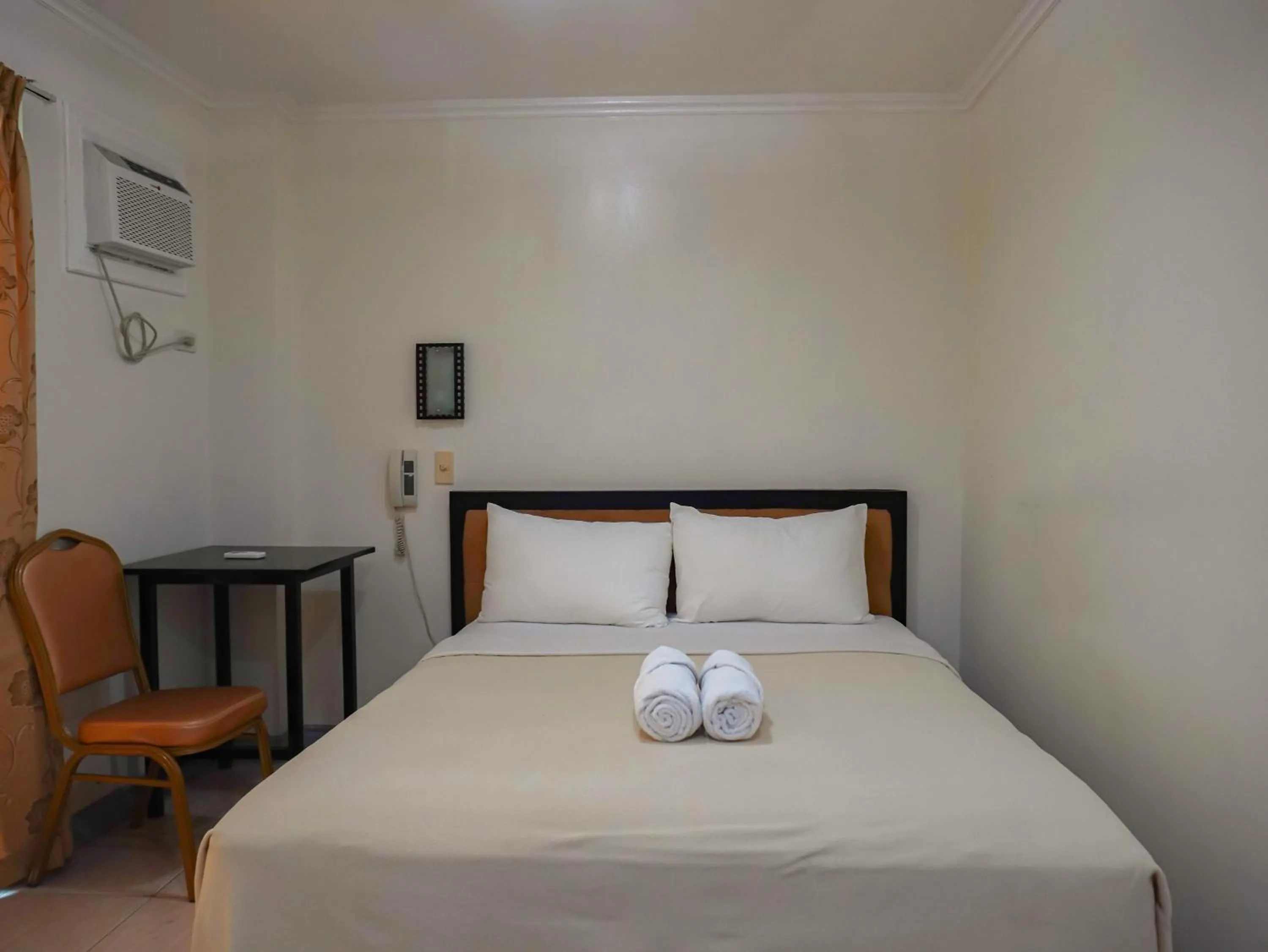 Bed in Boracay Paradise Hotel