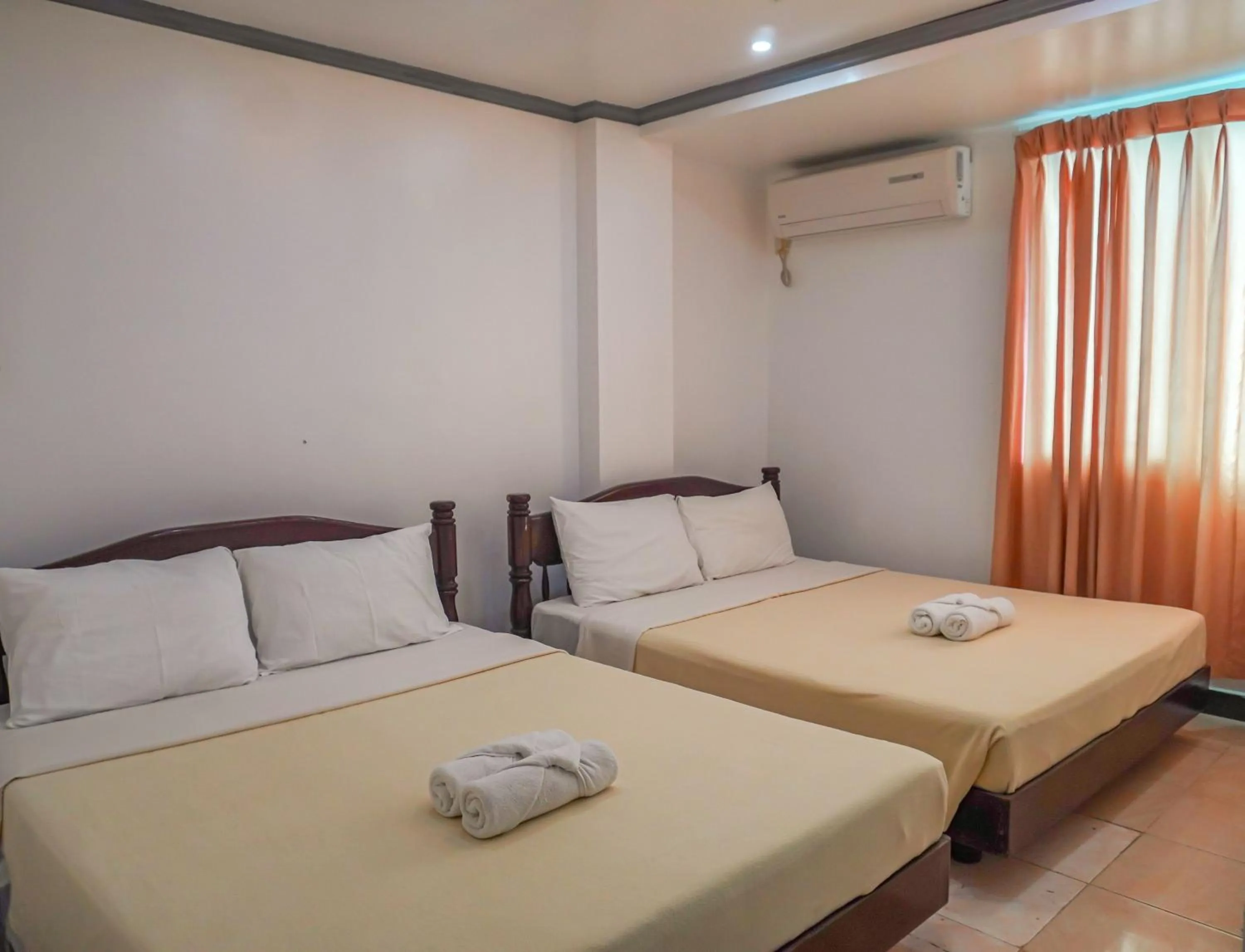 Bed in Boracay Paradise Hotel