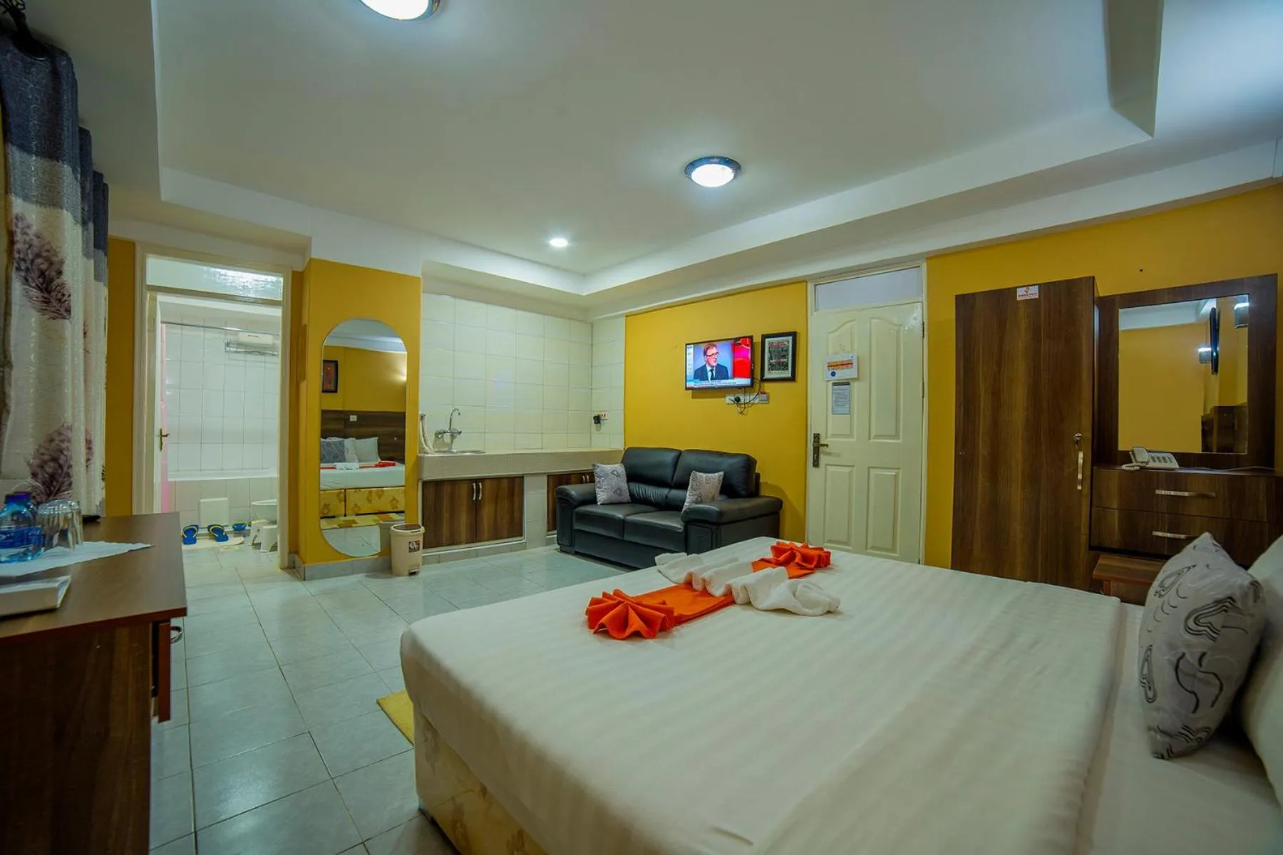 Toilet, Bed in Eureka Place Hotel Kampala