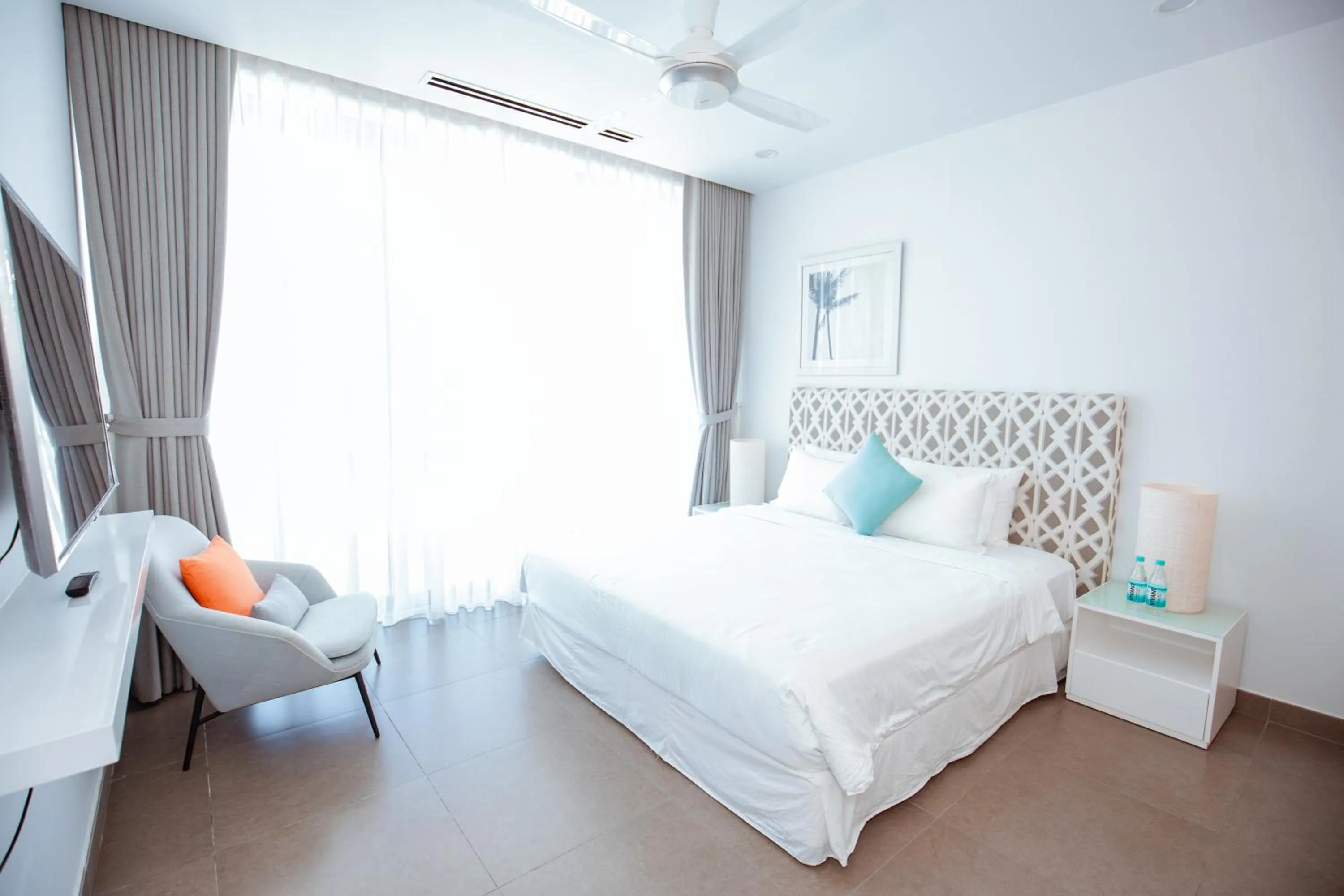 Bed in Beachfront 4 Bedrooms private pool villa Sanctuary Ho Tram resort